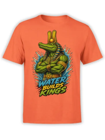 Orange T-shirt with a green Egyptian crocodile king, water splash, and “Water Builds Kings” graphic