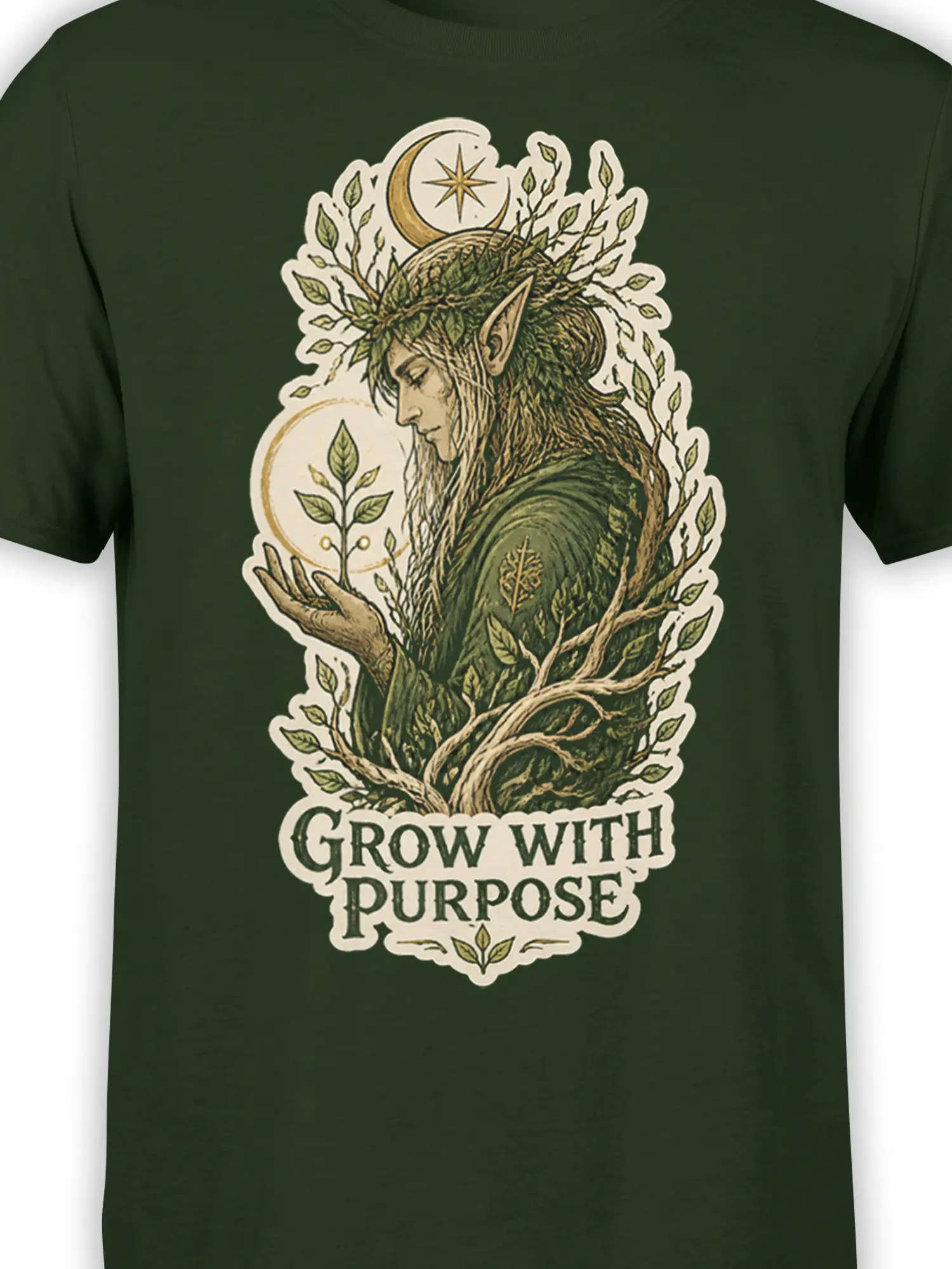 Close-up of the woodland elf, foliage, crescent moon, star, and purpose message on a green T-shirt