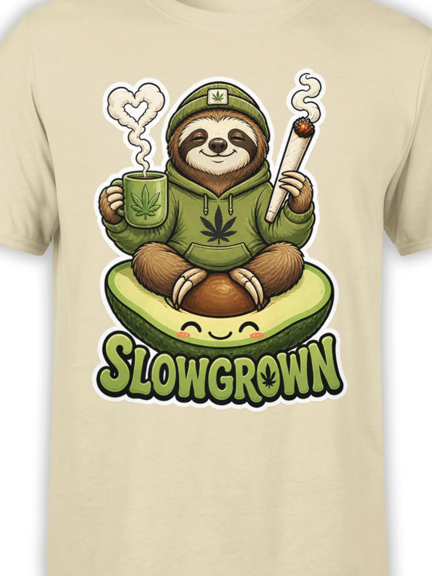 Close-up of sloth and avocado SLOWGROWN graphic with leafy details on beige fabric
