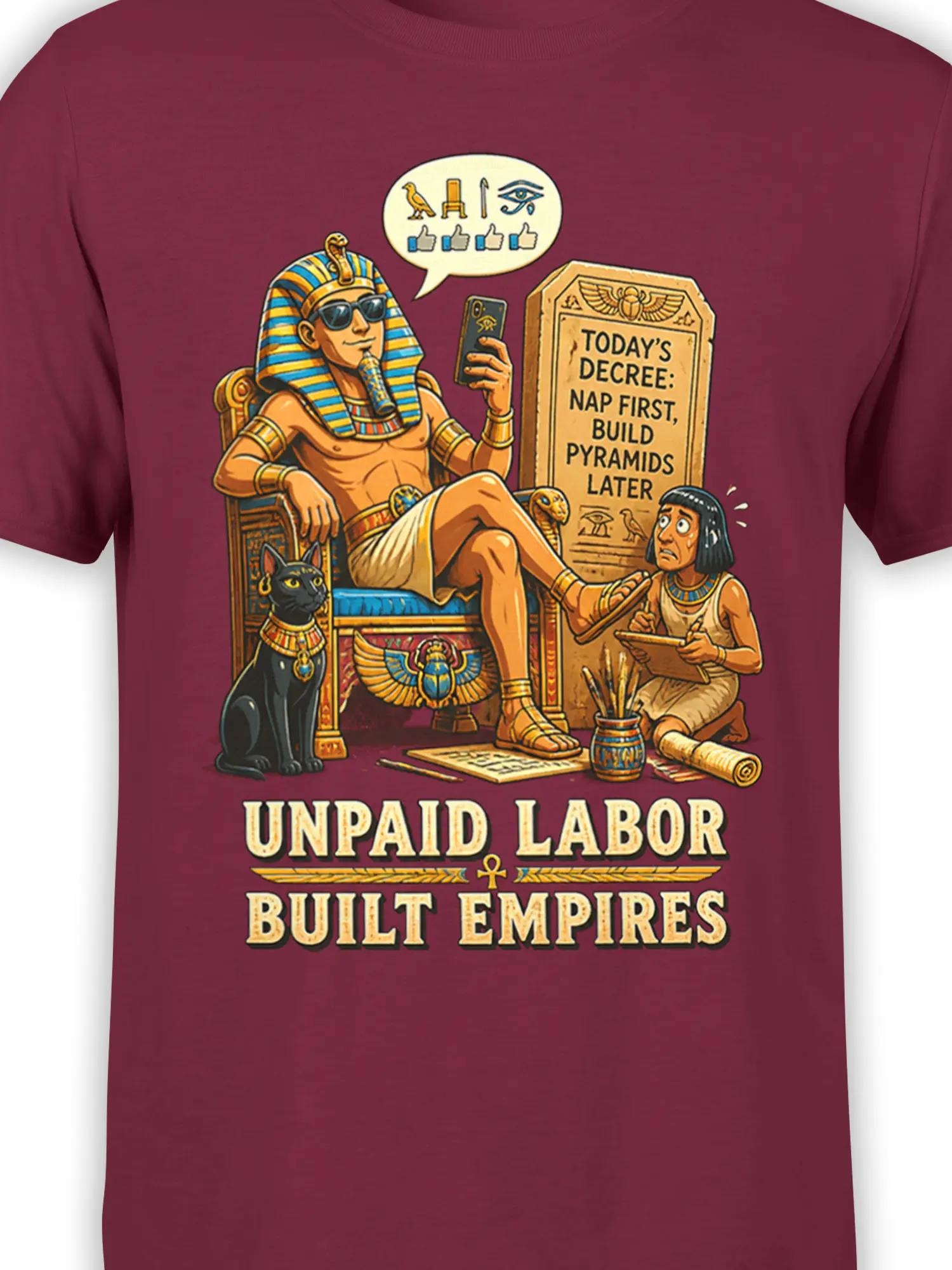 Close-up of lounging pharaoh and black cat artwork on a burgundy ancient Egypt graphic T-shirt