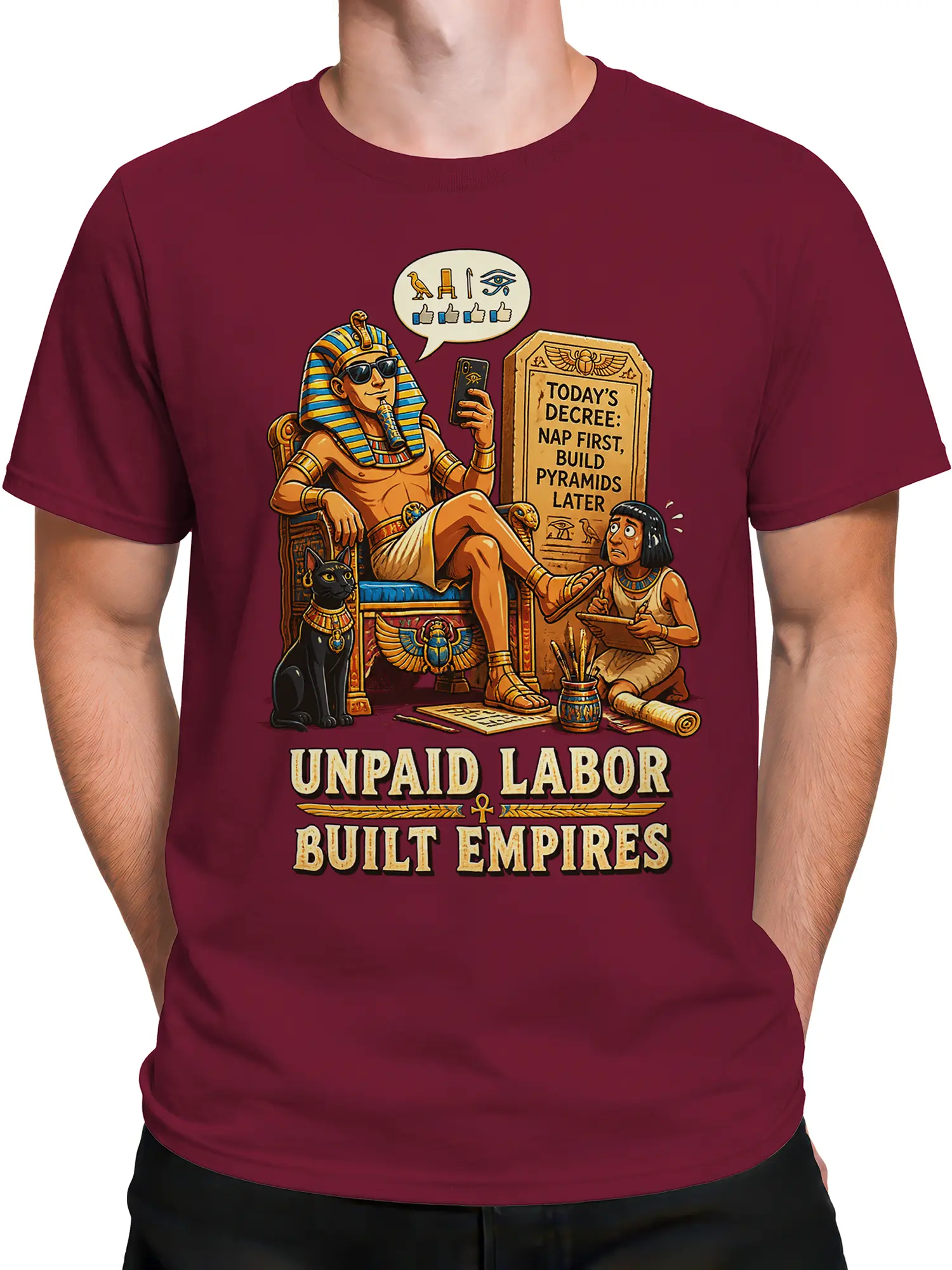 Male torso wearing a burgundy ancient Egypt T-shirt with lounging pharaoh and pyramid humor design