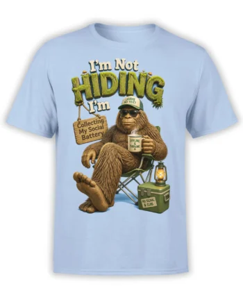 Light blue Bigfoot T-shirt with a relaxed sasquatch, coffee mug, lantern, and no signal camping message