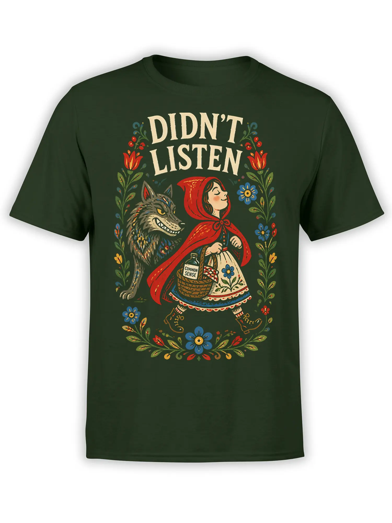 Front view of a green T-shirt with a red-hooded girl, grinning wolf, flowers, and “DIDN’T LISTEN” artwork