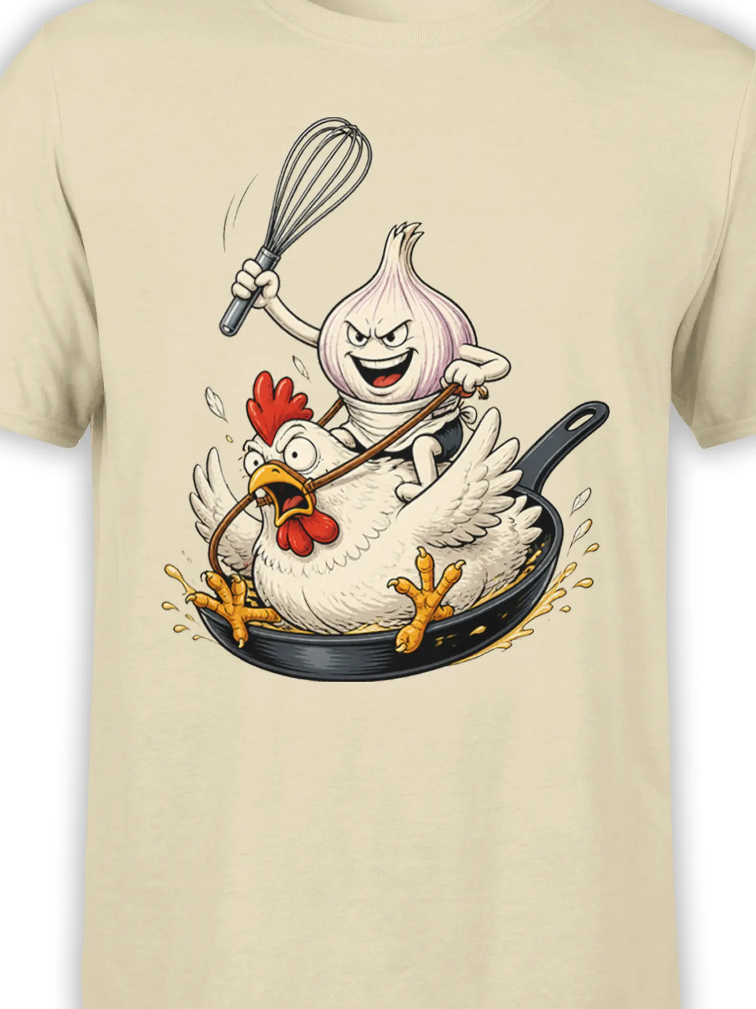 Close-up of the onion, whisk, startled chicken, and frying pan artwork on a beige T-shirt