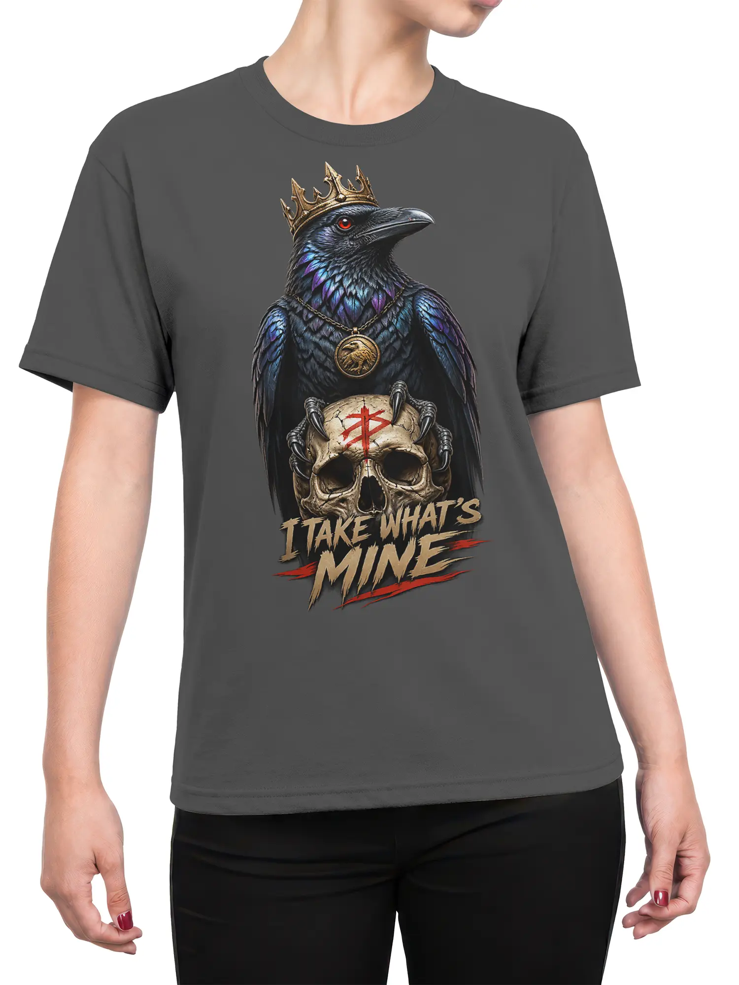 Female torso wearing a gray T-shirt with crowned raven and skull artwork