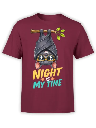 Maroon T-shirt with an upside-down bat in yellow lightning sunglasses and colorful “Night Is My Time” lettering