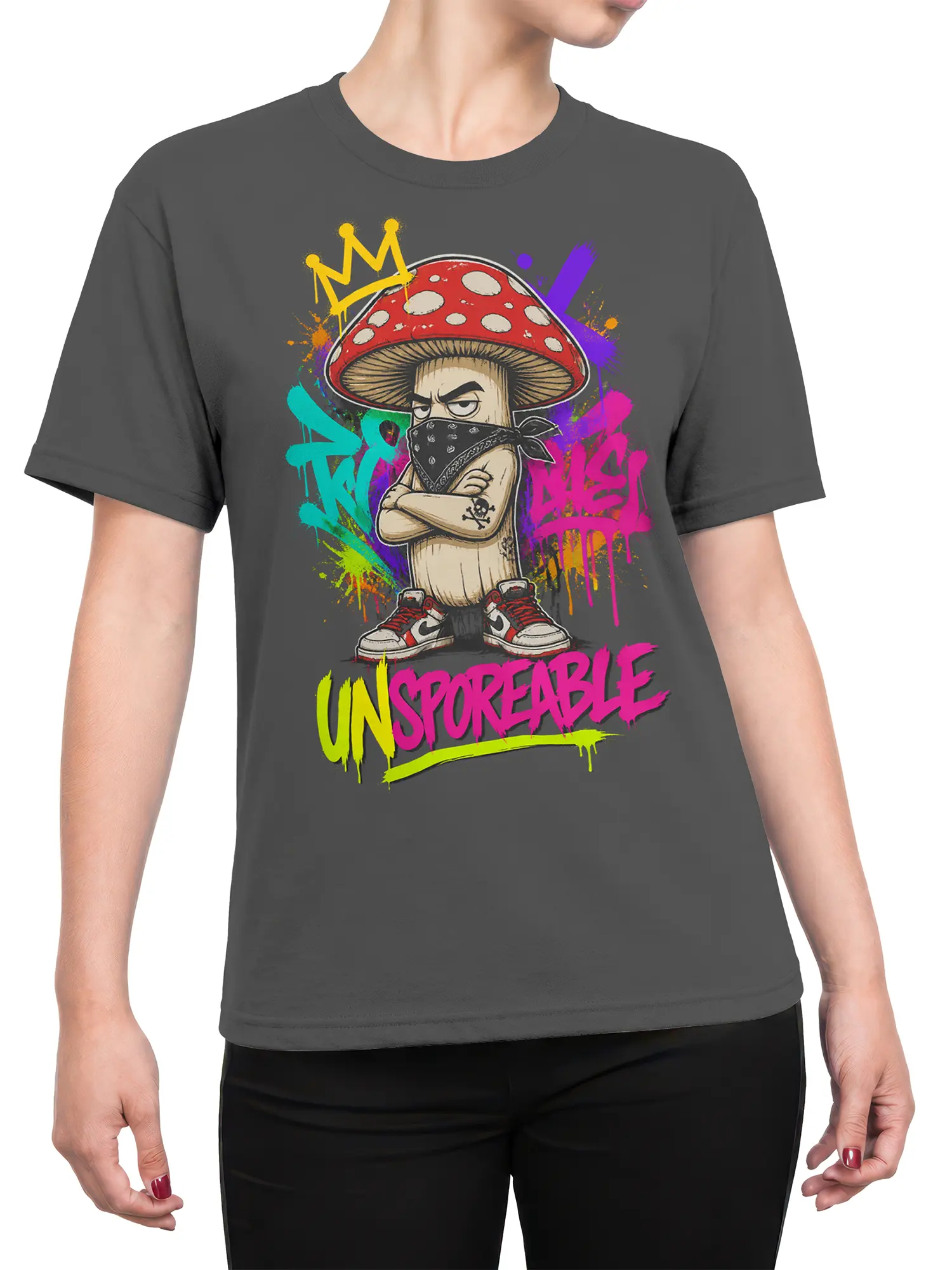 Female torso wearing a dark gray mushroom graphic tee with colorful graffiti artwork and UNSPOKEABLE lettering