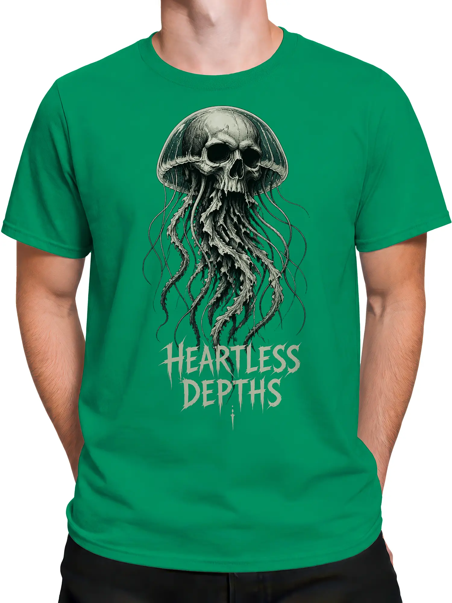 Male torso wearing a green T-shirt with a skull jellyfish and Heartless Depths graphic