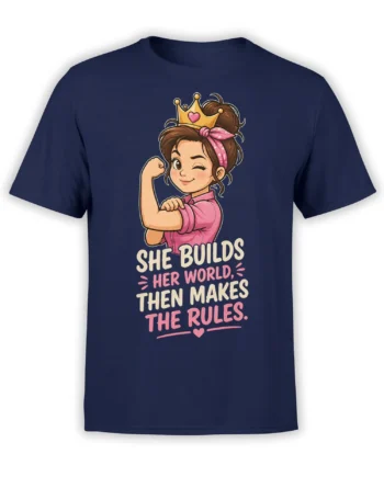 Crowned woman flexing on a navy T-shirt with “She Builds Her World, Then Makes the Rules” design