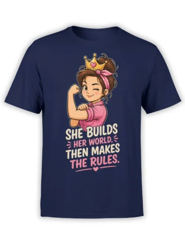 Crowned woman flexing on a navy T-shirt with “She Builds Her World, Then Makes the Rules” design