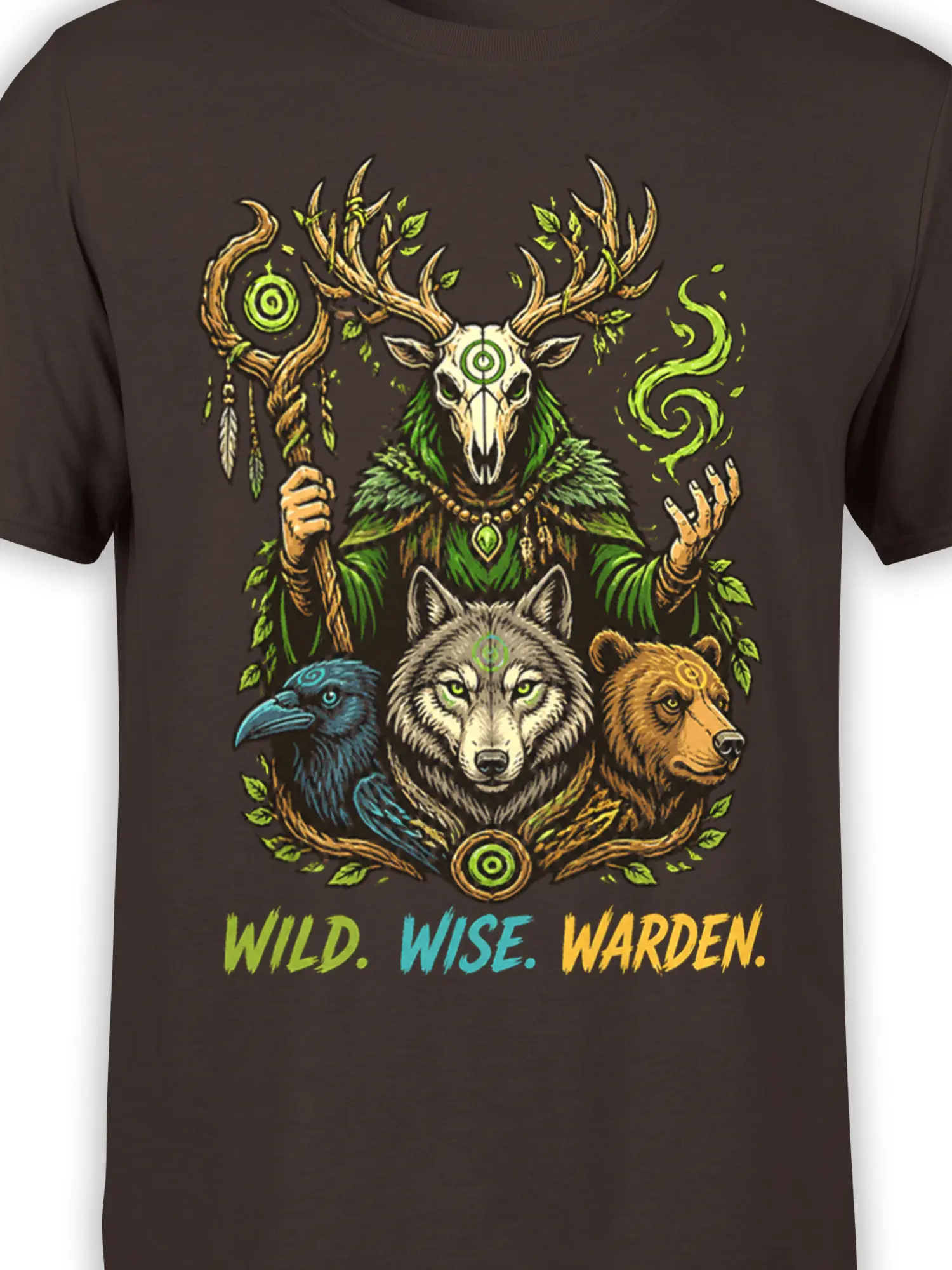 Close-up of brown shirt artwork showing the deer skull guardian, wolf, raven, bear, antlers, leaves, and green mystical symbols