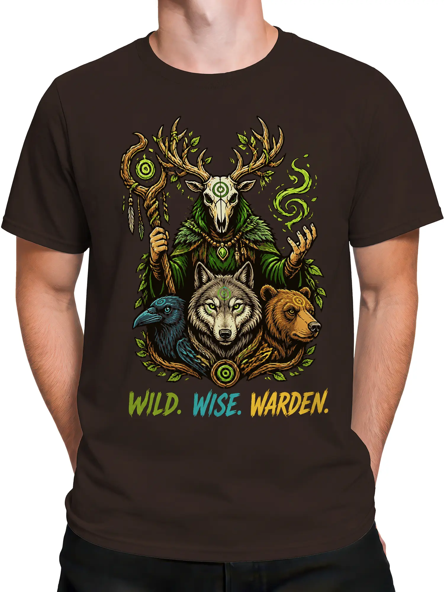 Male torso wearing a brown fantasy graphic tee with a deer skull guardian, wolf, raven, bear, and colorful woodland artwork