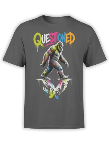 Gray T-shirt with a colorful ape-like mystery creature, QUESTIONED text, and shadowy figures below