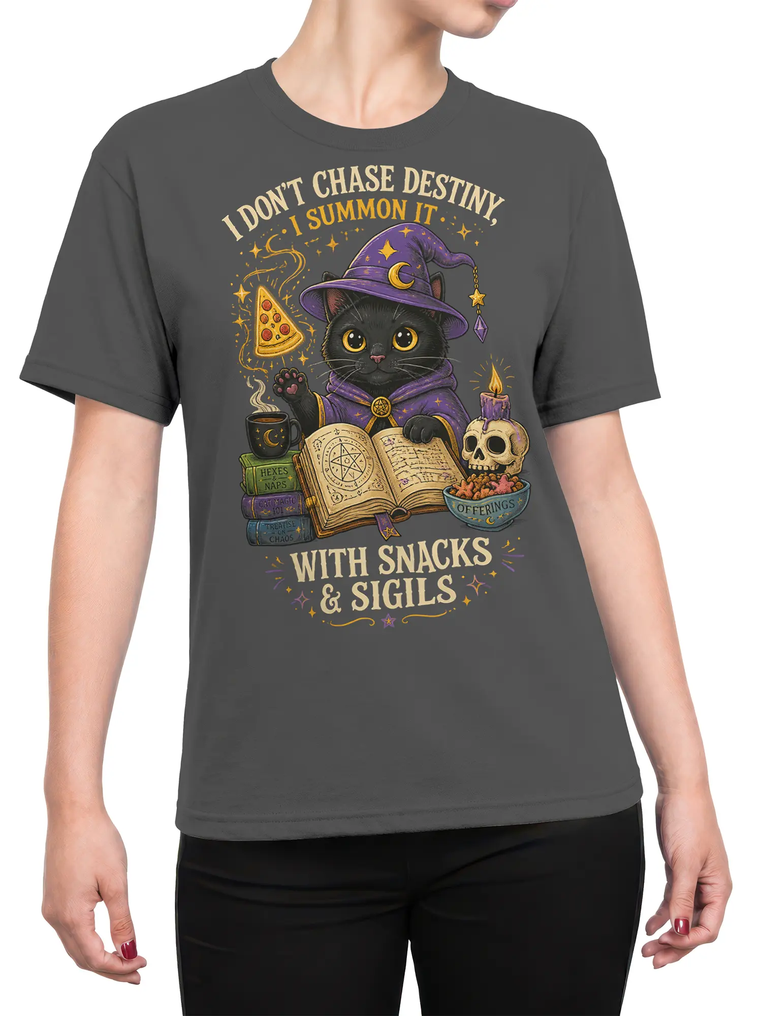 Female torso wearing a gray T-shirt with a black cat wizard, spellbooks, pizza, and mystical snack-themed artwork