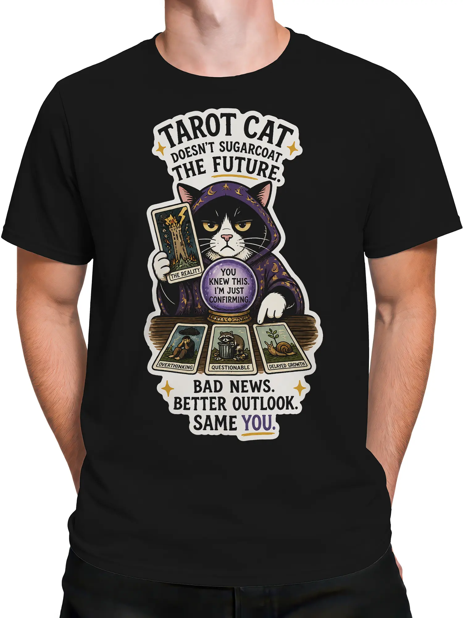 Male torso wearing a black T-shirt with hooded cat tarot reader and crystal ball artwork