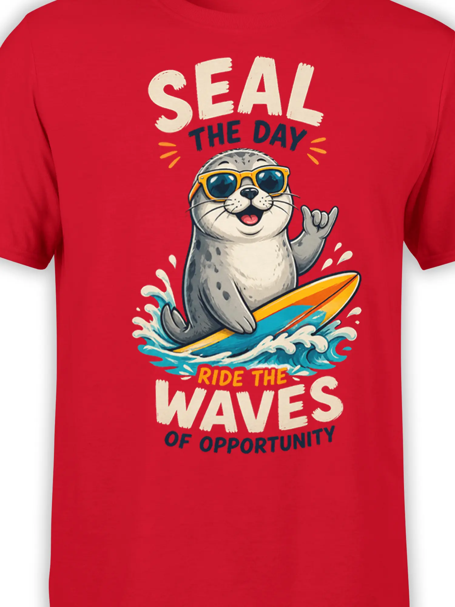 Close-up of seal surfing artwork on a red T-shirt with sunglasses, waves, and bold motivational lettering