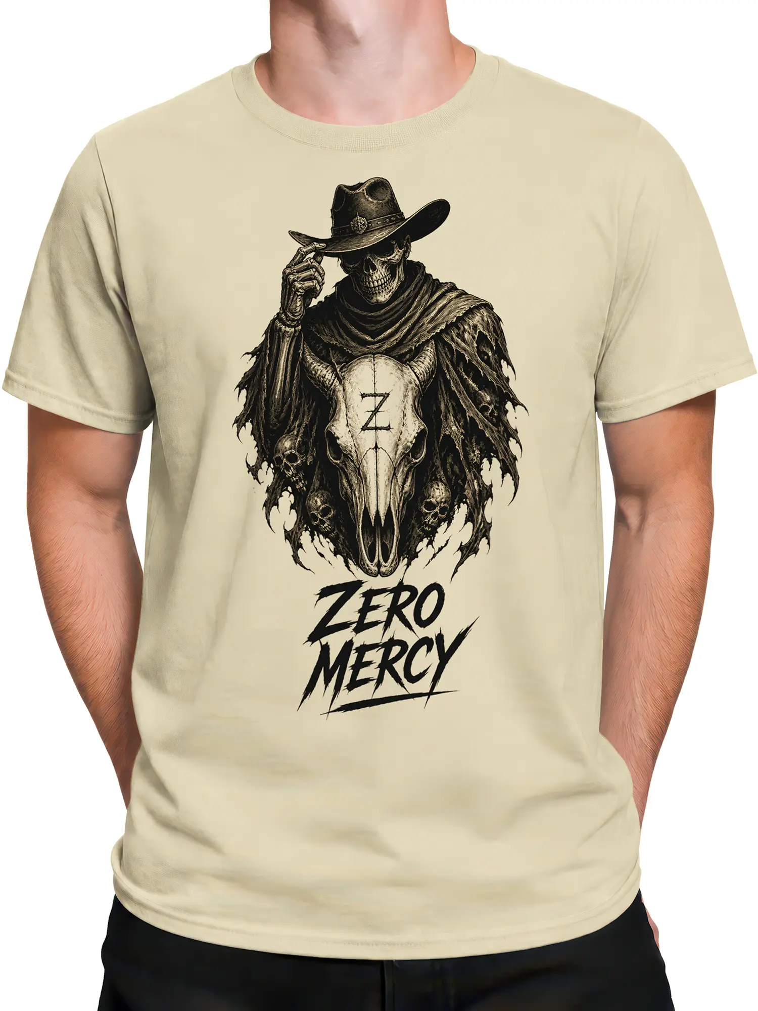 Male torso wearing a beige T-shirt with a horned cowboy skull and Zero Mercy graphic
