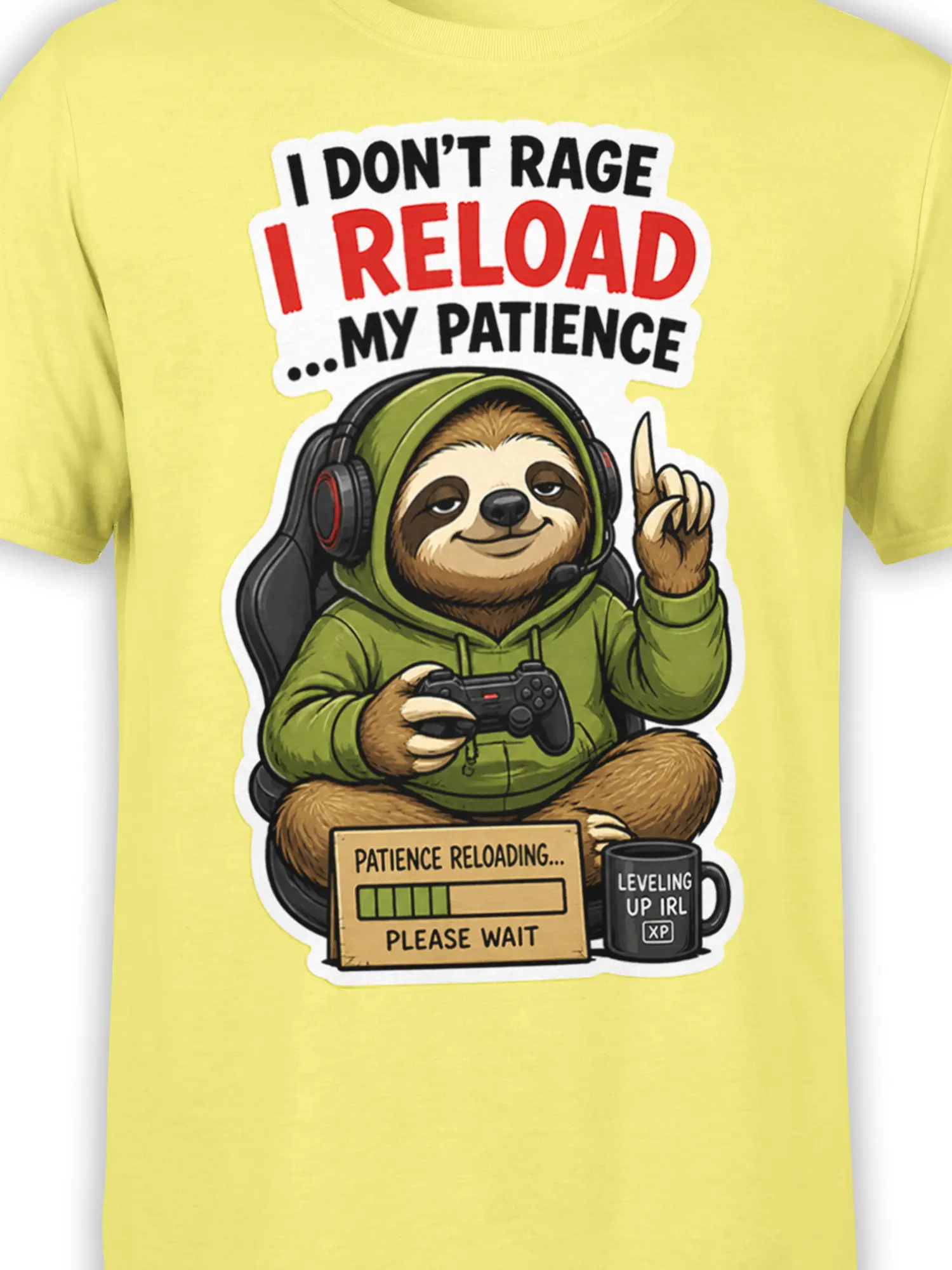 Close-up of sloth gamer artwork with controller, headset, patience reloading sign, and leveling up mug on yellow fabric