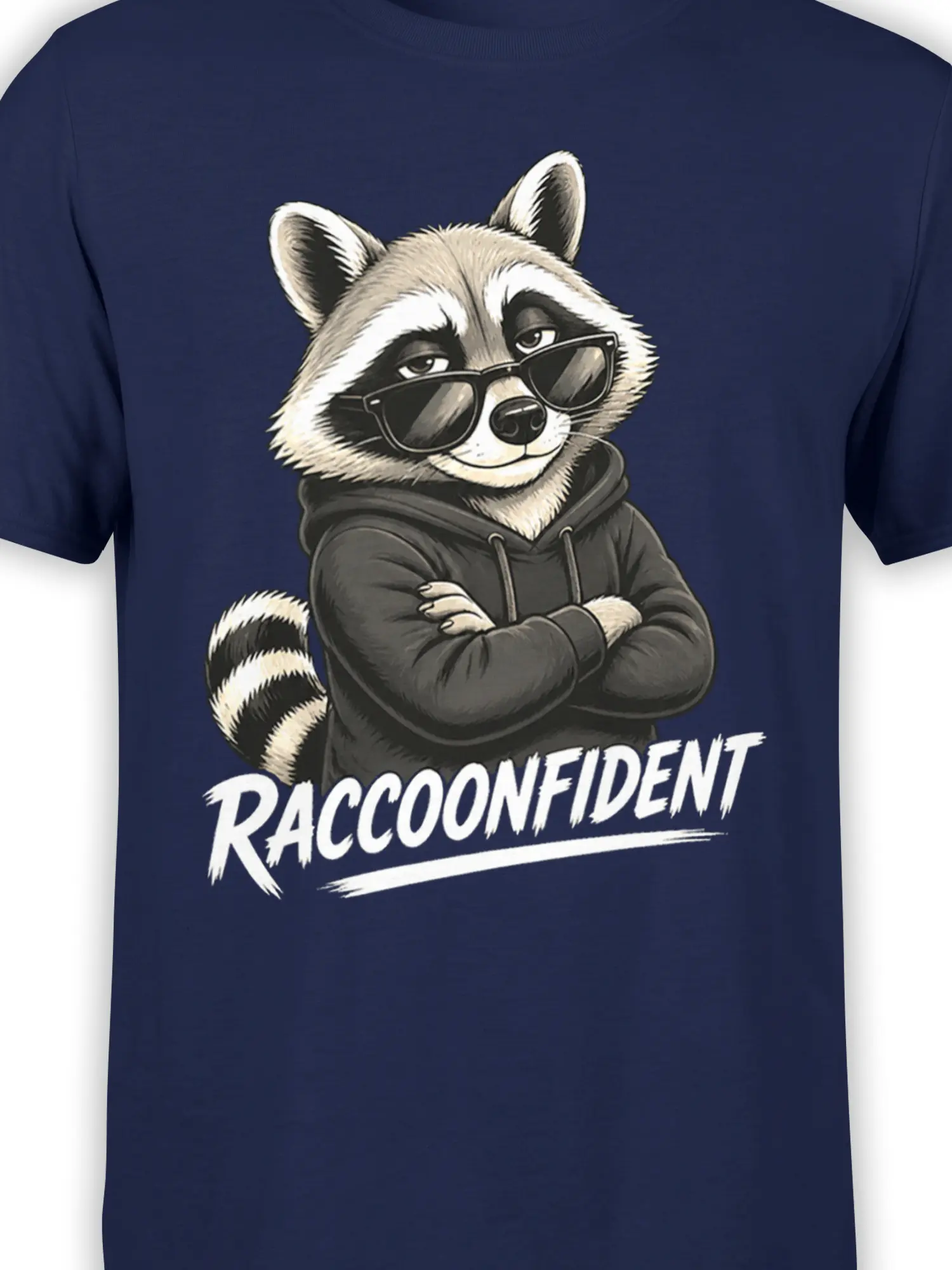 Close-up of sunglasses-wearing raccoon artwork and bold lettering on a navy graphic T-shirt