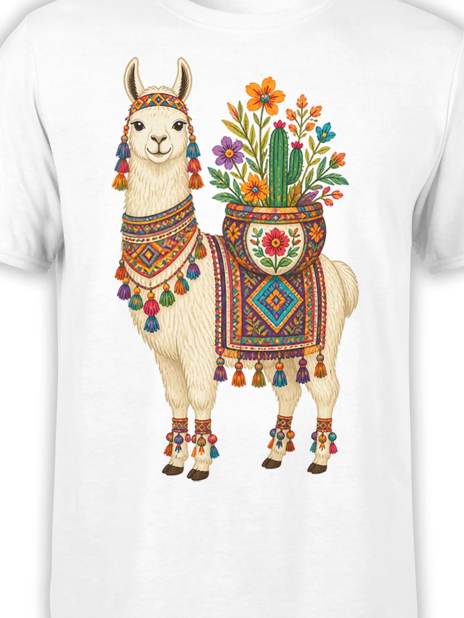 Close-up of colorful llama artwork with patterned textiles, tassels, cactus, and flowers on a white T-shirt