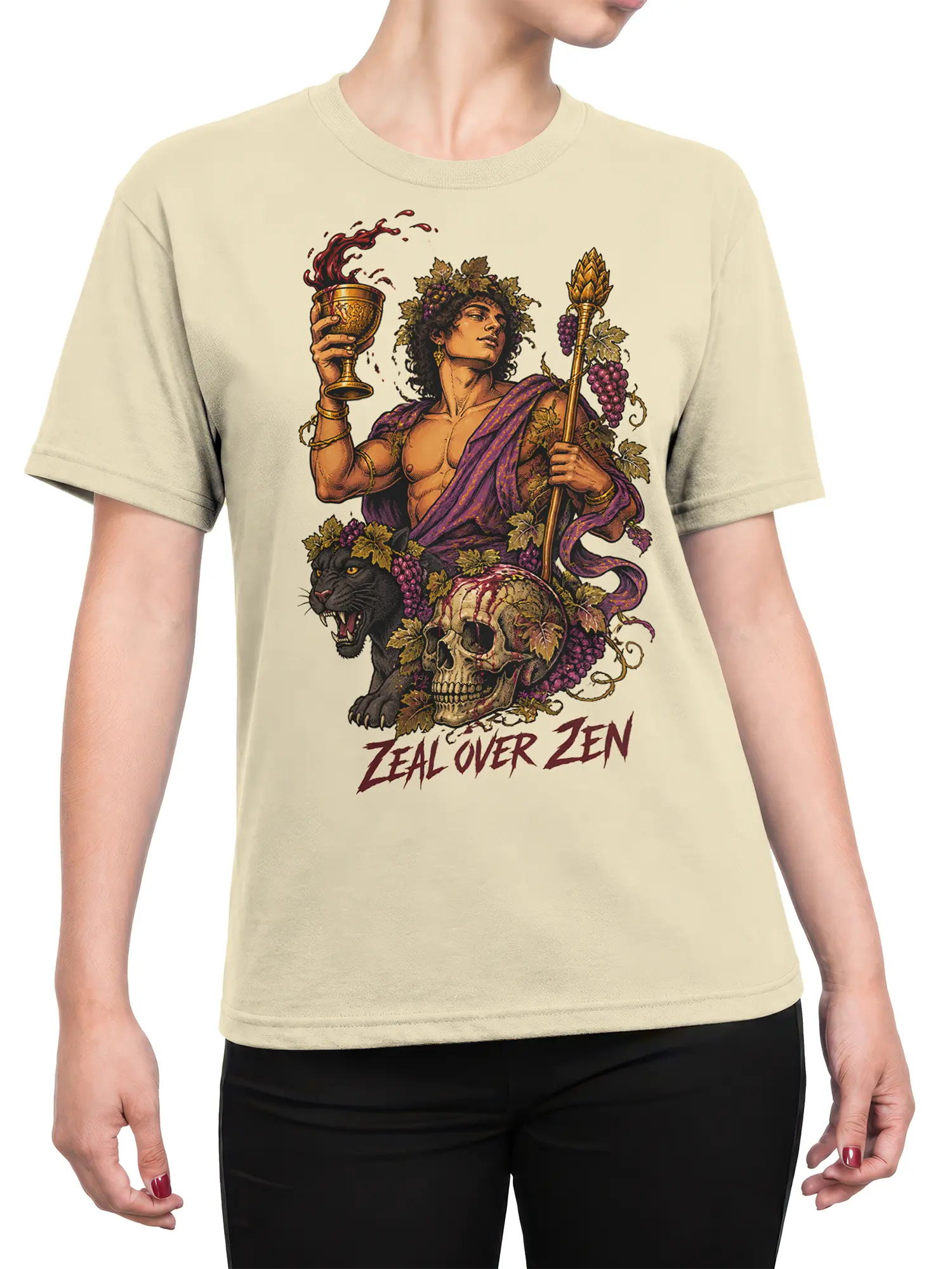 Female torso wearing a beige mythology T-shirt with grapes, panther, skull, and Zeal Over Zen graphic