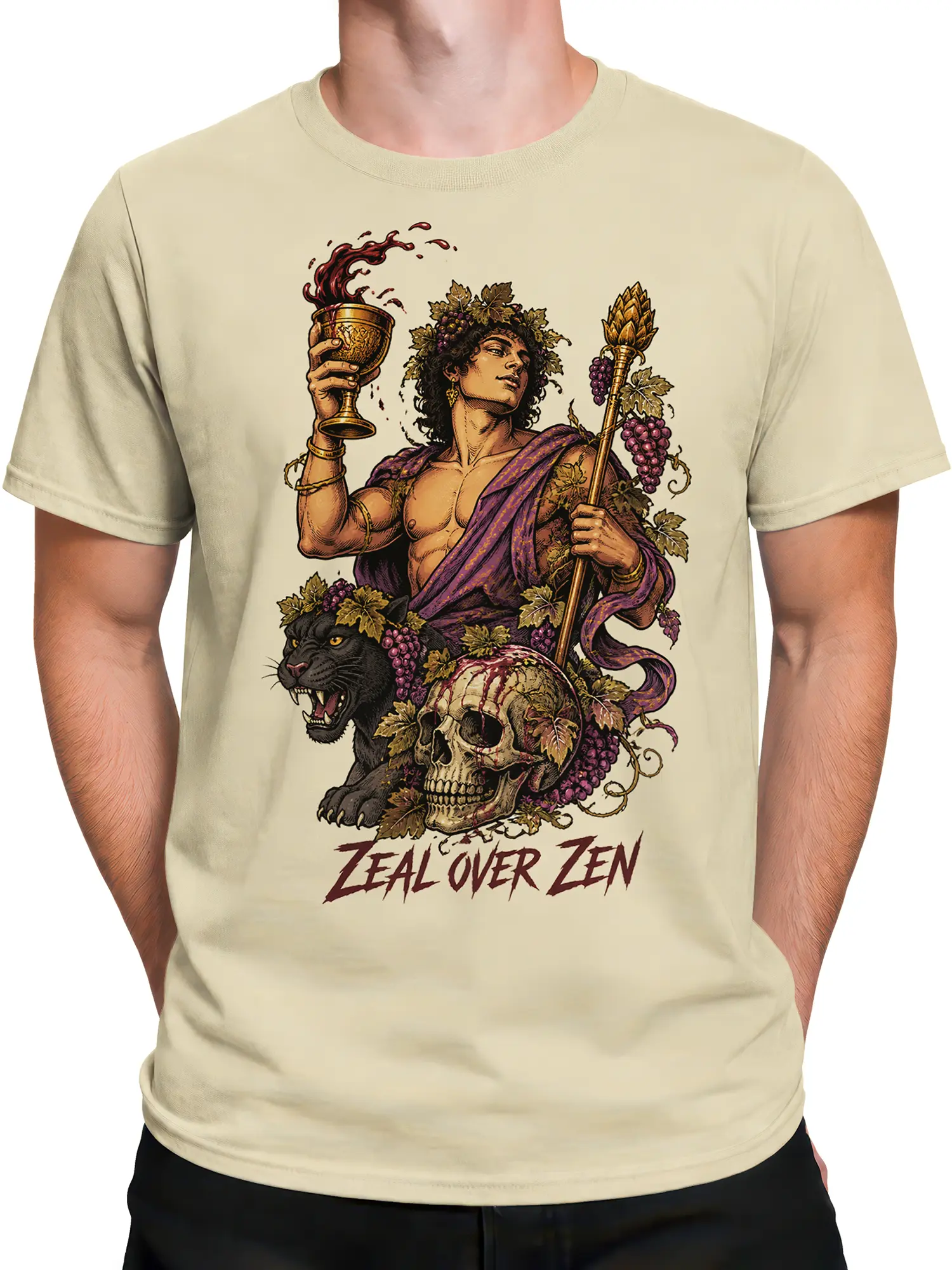 Male torso wearing a beige mythology T-shirt with panther, grapes, skull, and Zeal Over Zen artwork