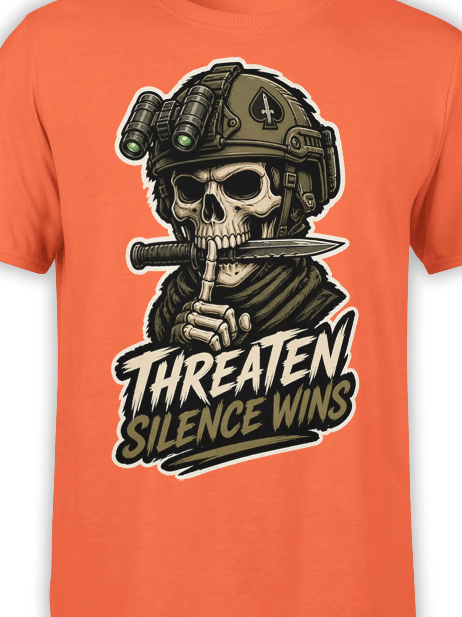 Close-up of skull soldier artwork on an orange T-shirt with helmet, binoculars, blade, and bold military lettering