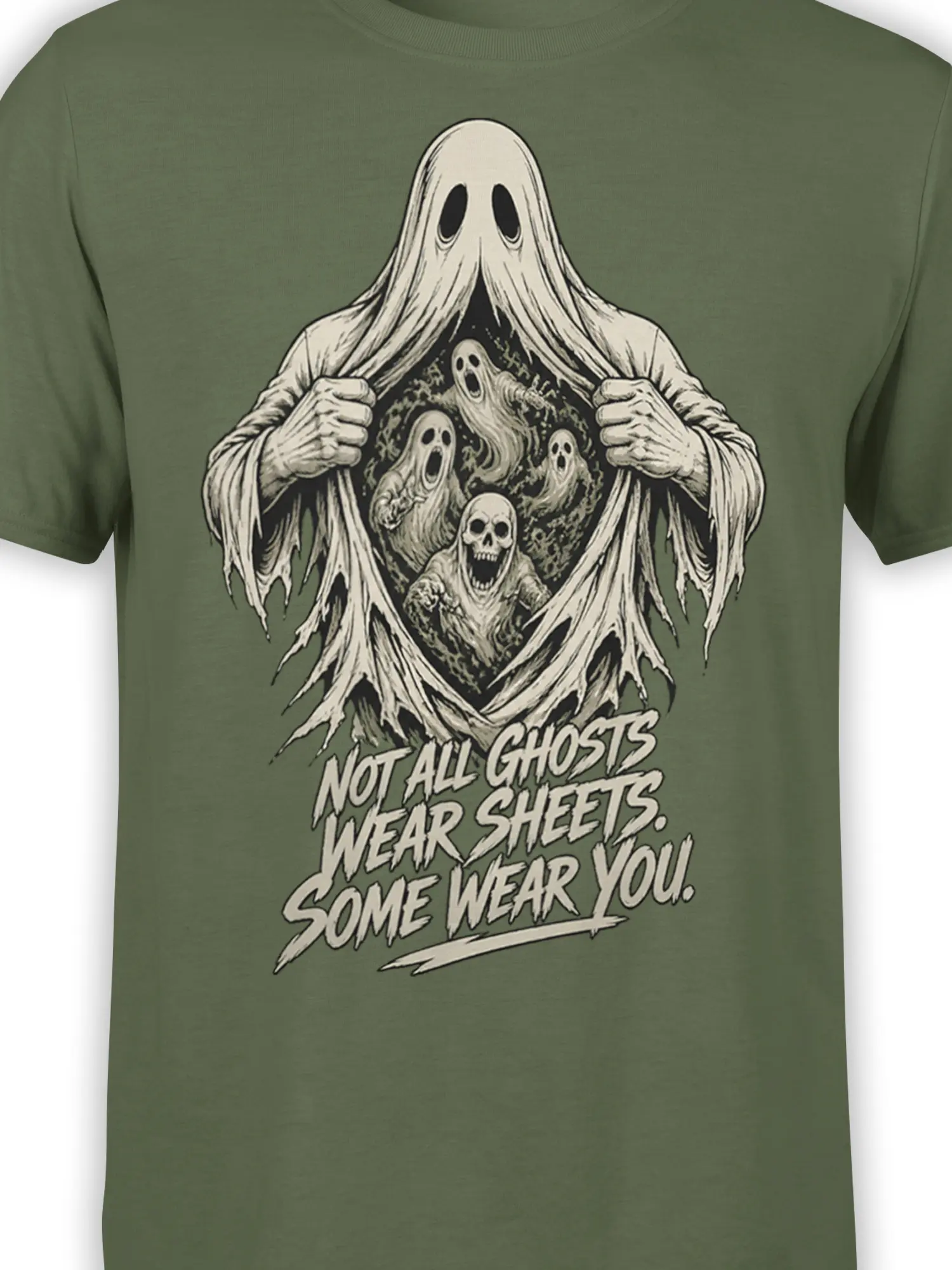 Close-up of green ghost T-shirt artwork showing sheet spirits, skull details, and bold lettering