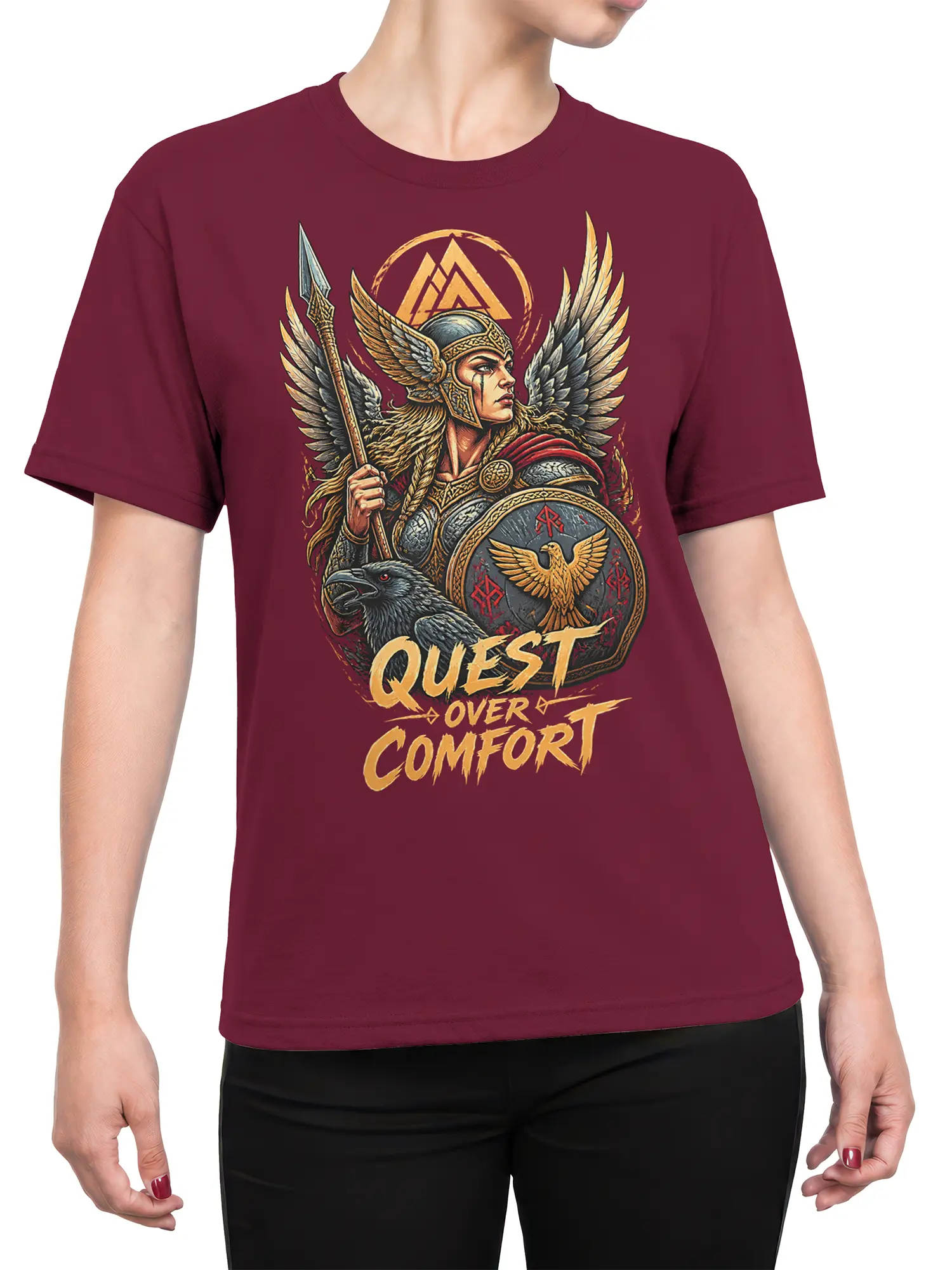 Female torso wearing a burgundy fantasy T-shirt with a winged warrior, raven, shield, and quest lettering