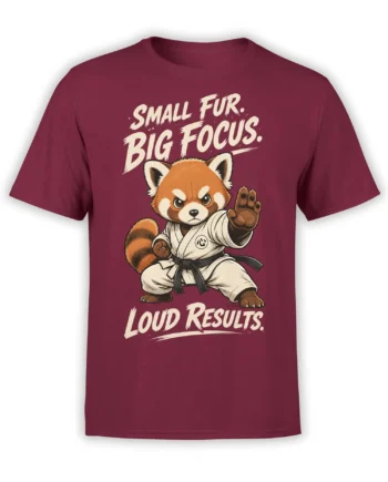 Focused red panda in a martial arts uniform on a burgundy T-shirt with bold motivational lettering