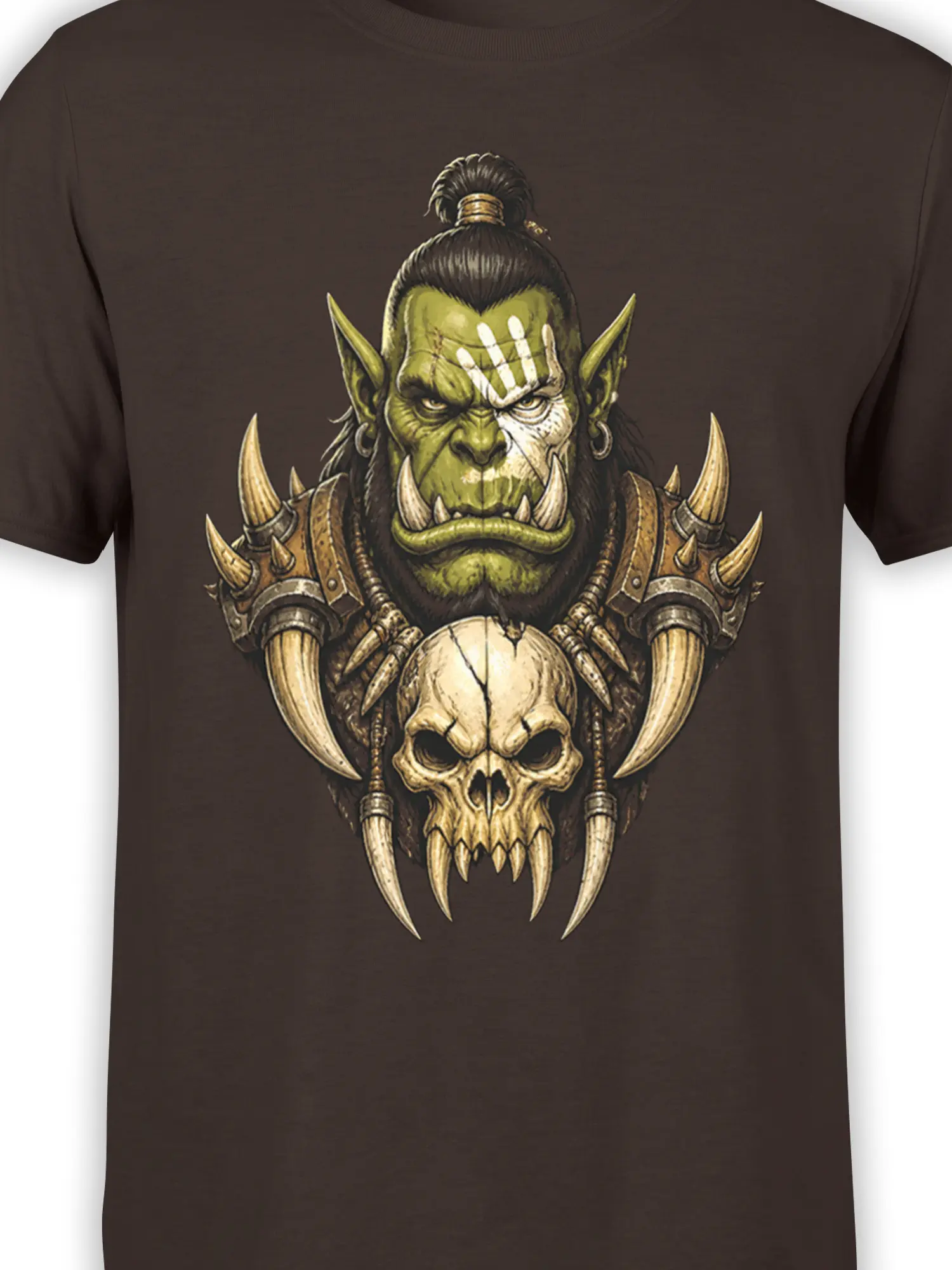 Close-up of green orc warrior artwork with tusks, face paint, and skull armor on a brown T-shirt