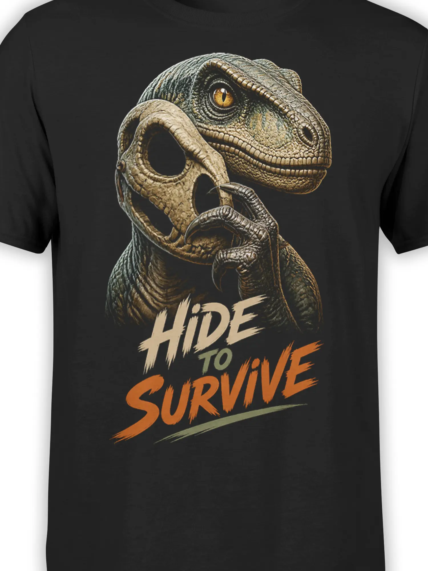 Close-up of a raptor-inspired dinosaur design with textured scales and survival lettering on a black shirt