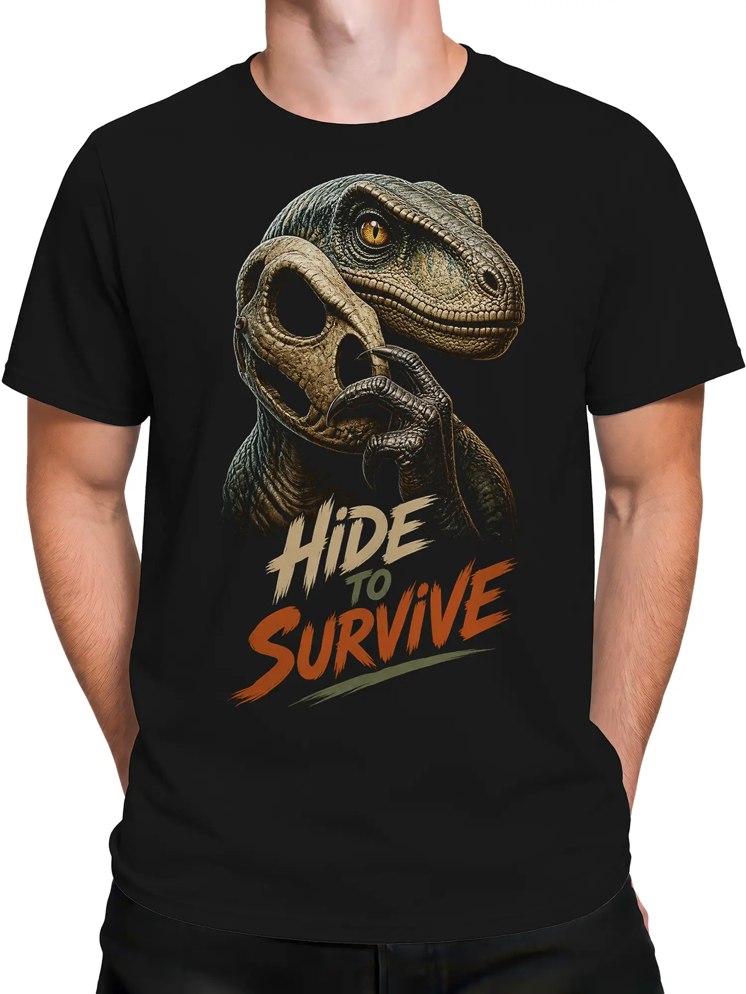 Male torso wearing a black dinosaur T-shirt with a raptor-inspired graphic and survival slogan