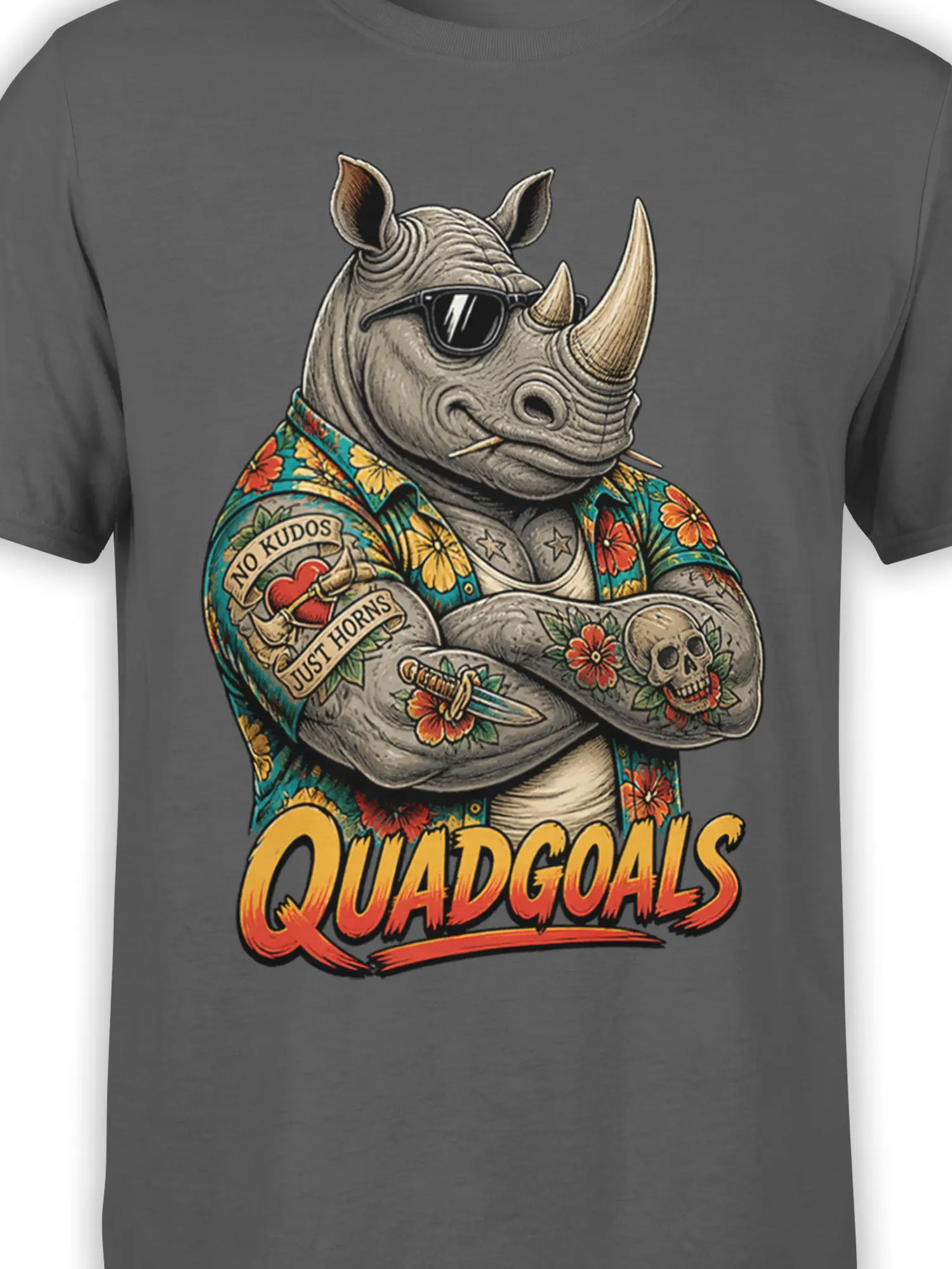 Close-up of rhino graphic tee showing sunglasses, horns, floral shirt, tattoos, and Quadgoals lettering