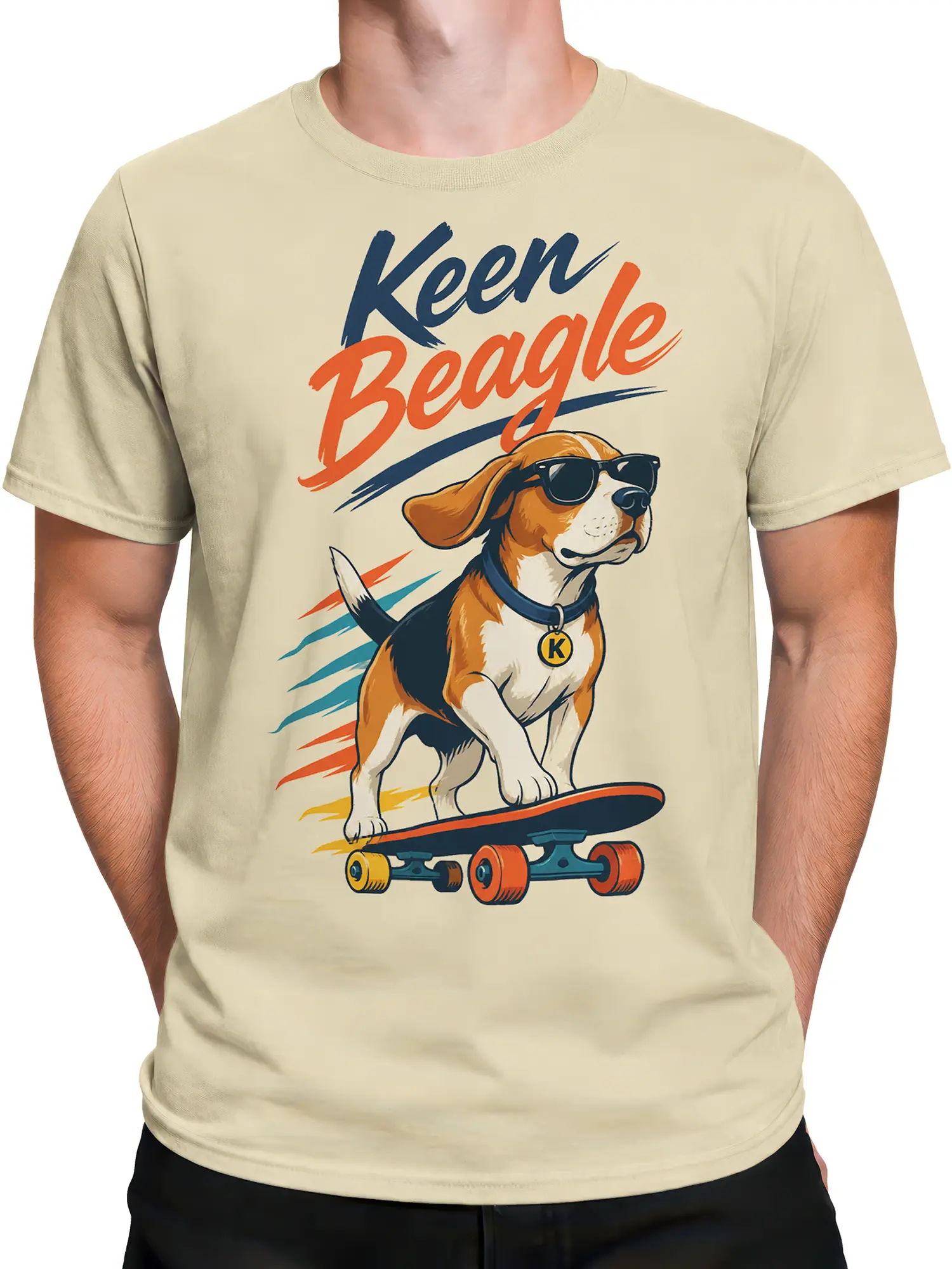 Male torso wearing a beige dog graphic T-shirt with a beagle on a skateboard and bold lettering