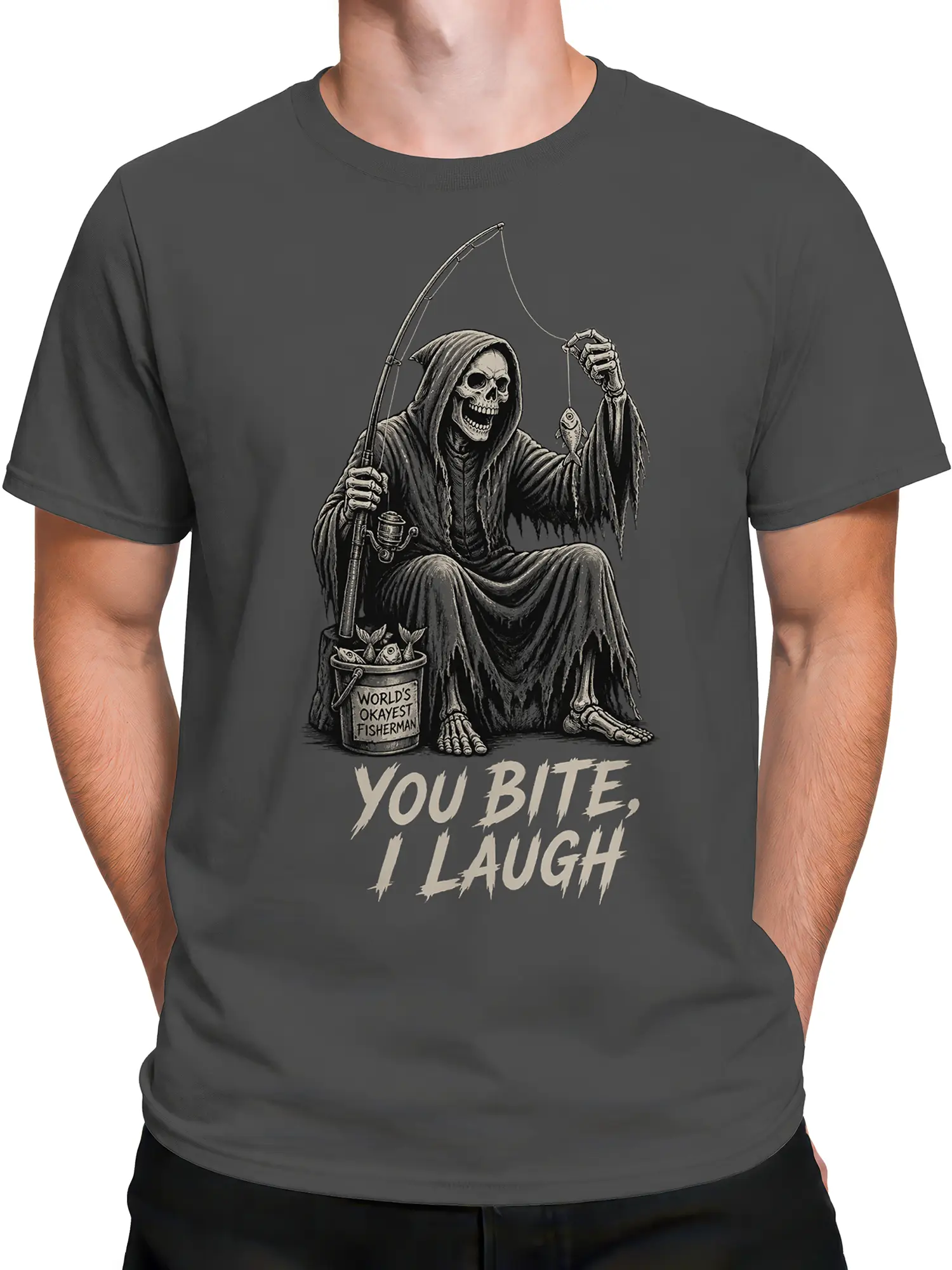 Male torso wearing a gray fishing graphic tee with a hooded skeleton angler and “You Bite, I Laugh” text