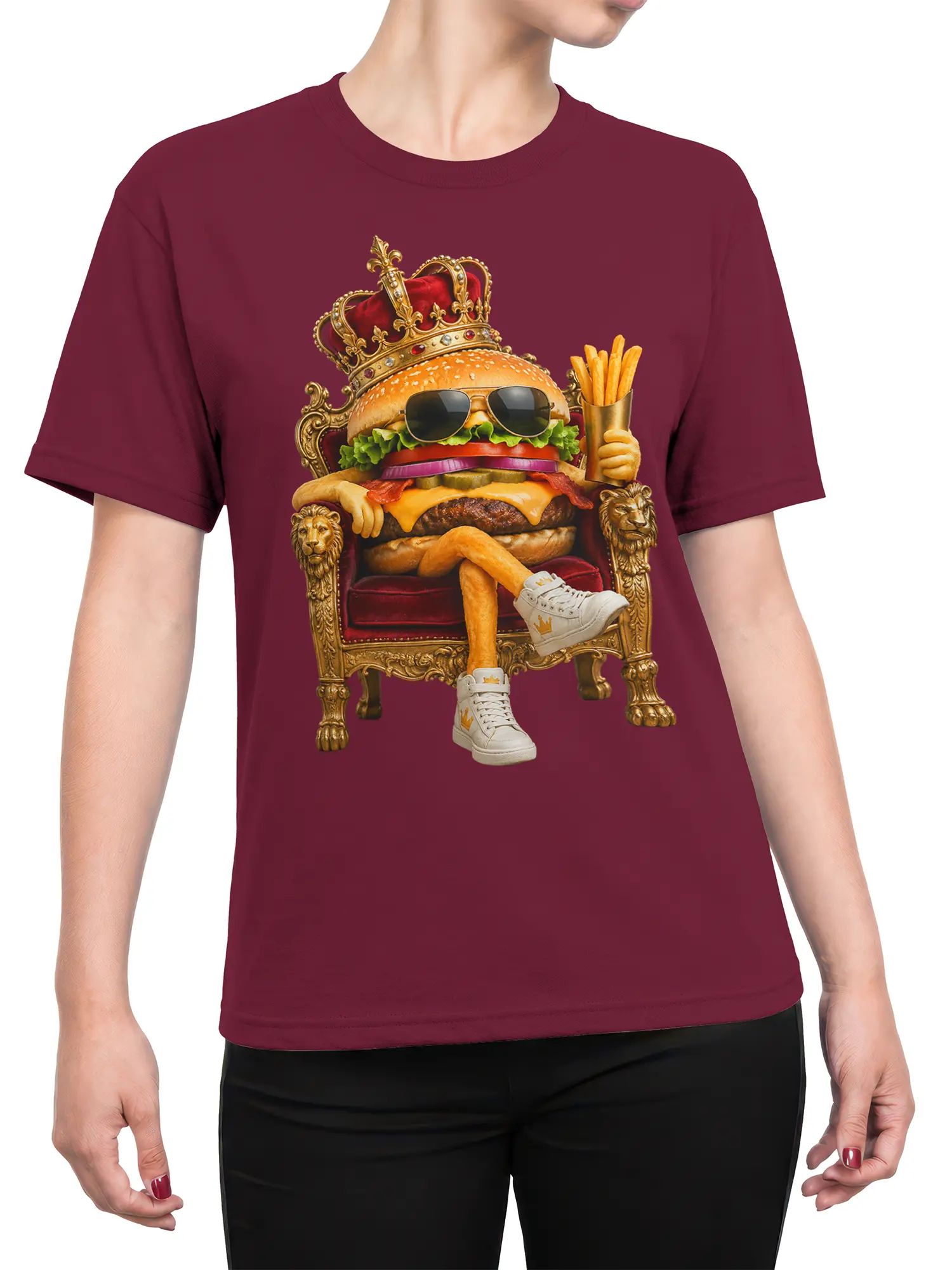 Female torso wearing a burgundy T-shirt with a crowned burger, fries, sunglasses, and throne design