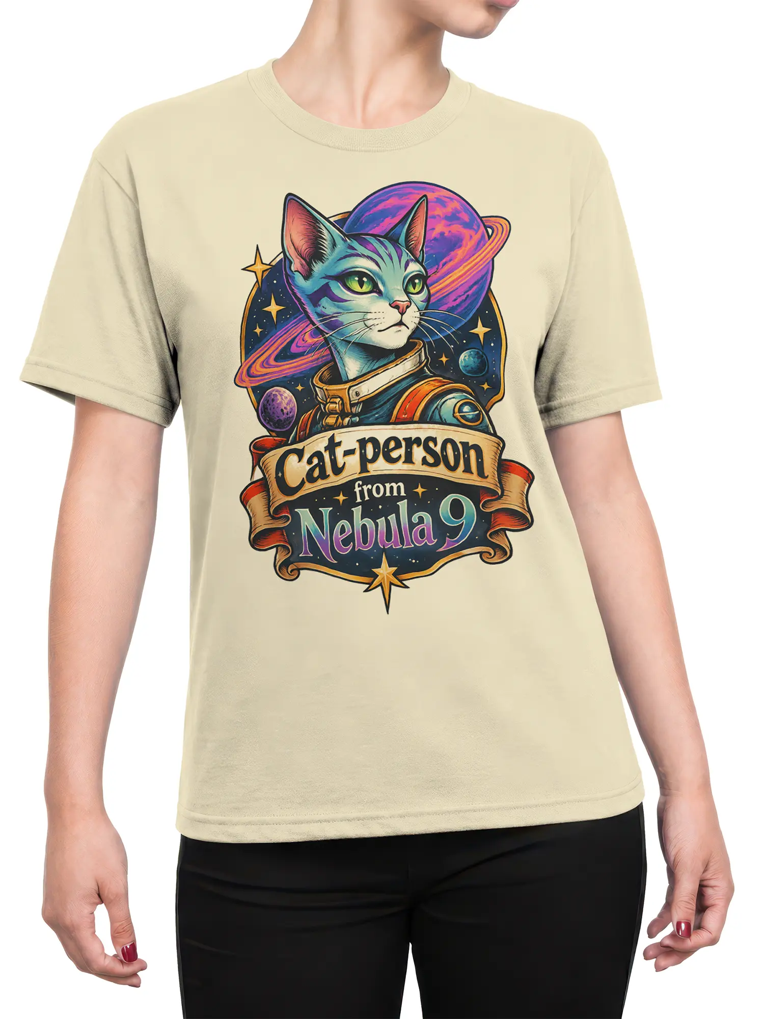 Female torso wearing a beige cosmic cat T-shirt with a colorful space-suited feline, planets, stars, and Nebula 9 design