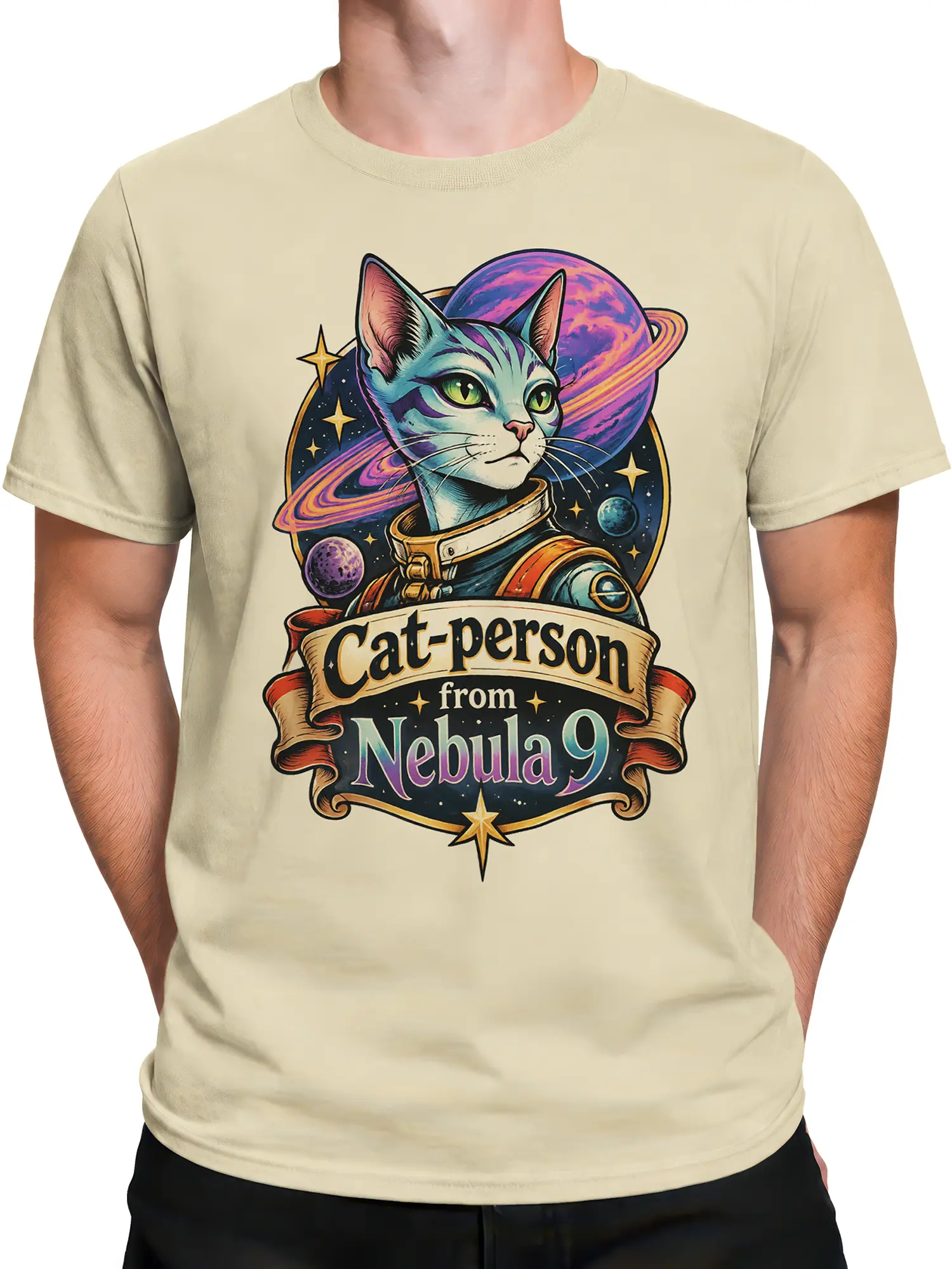 Male torso wearing a beige cosmic cat T-shirt with a vintage space feline, ringed planet, stars, and Nebula 9 graphic