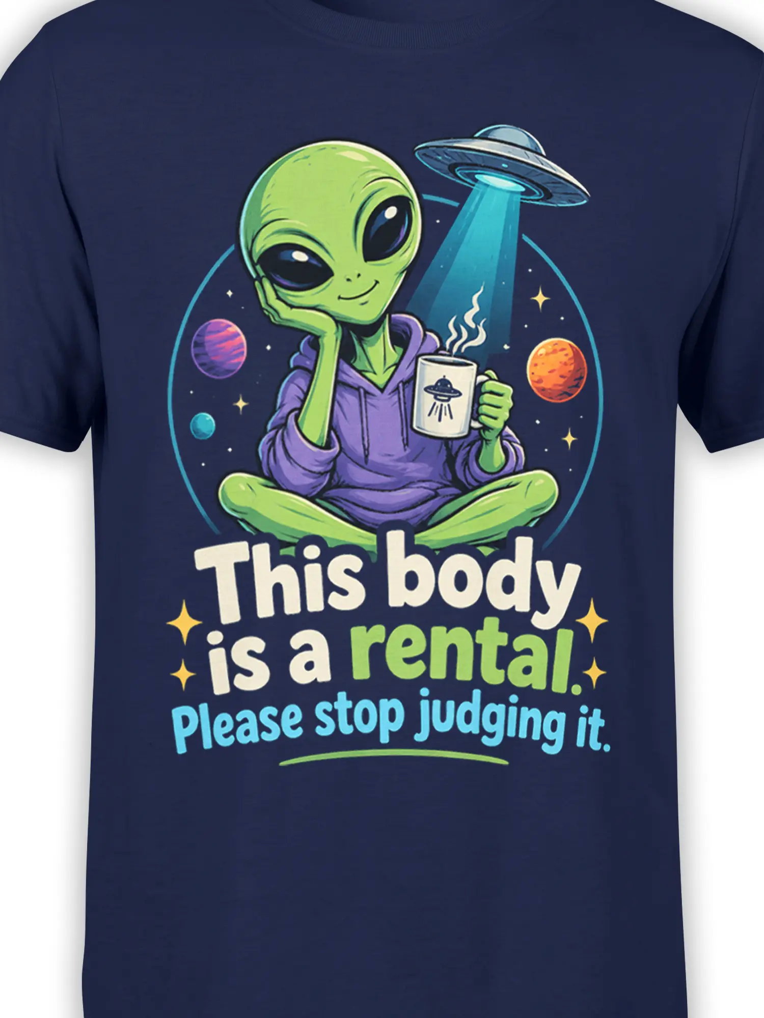 Close-up of green alien, UFO mug, planets, stars, and rental body message on navy fabric