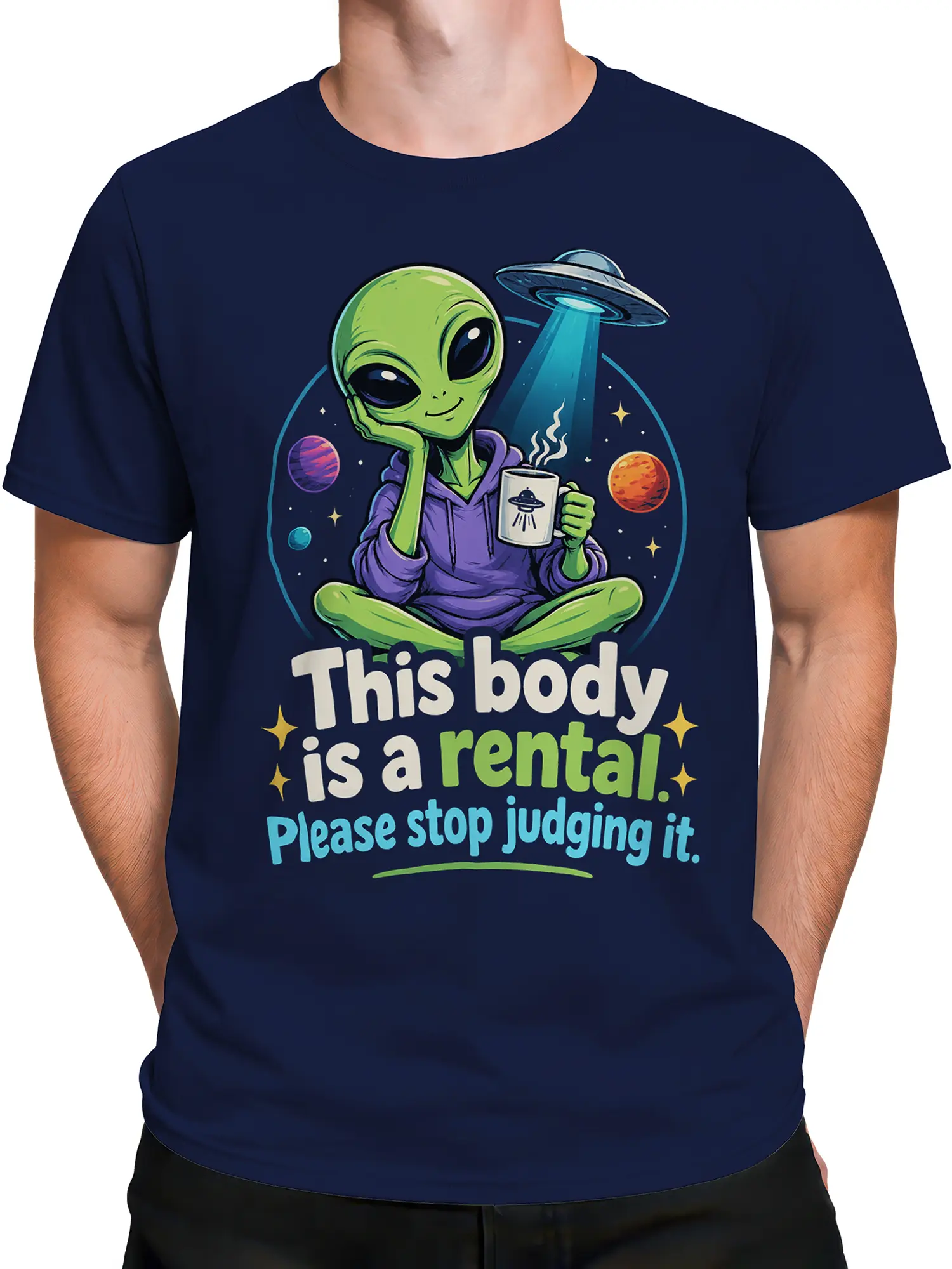 Male torso wearing a navy alien T-shirt with a green alien, UFO mug, and space artwork