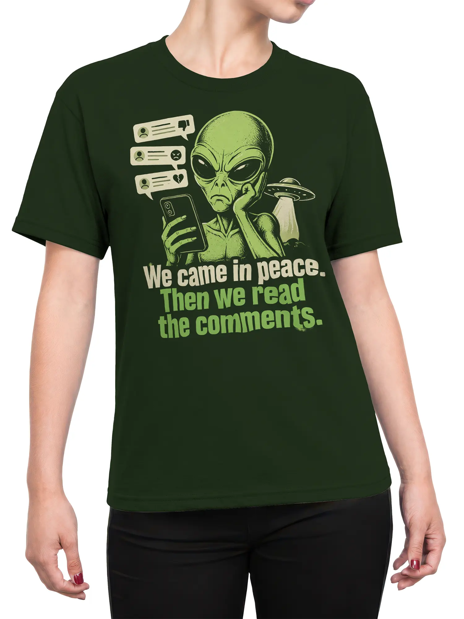 Female torso wearing a green alien T-shirt about reading online comments