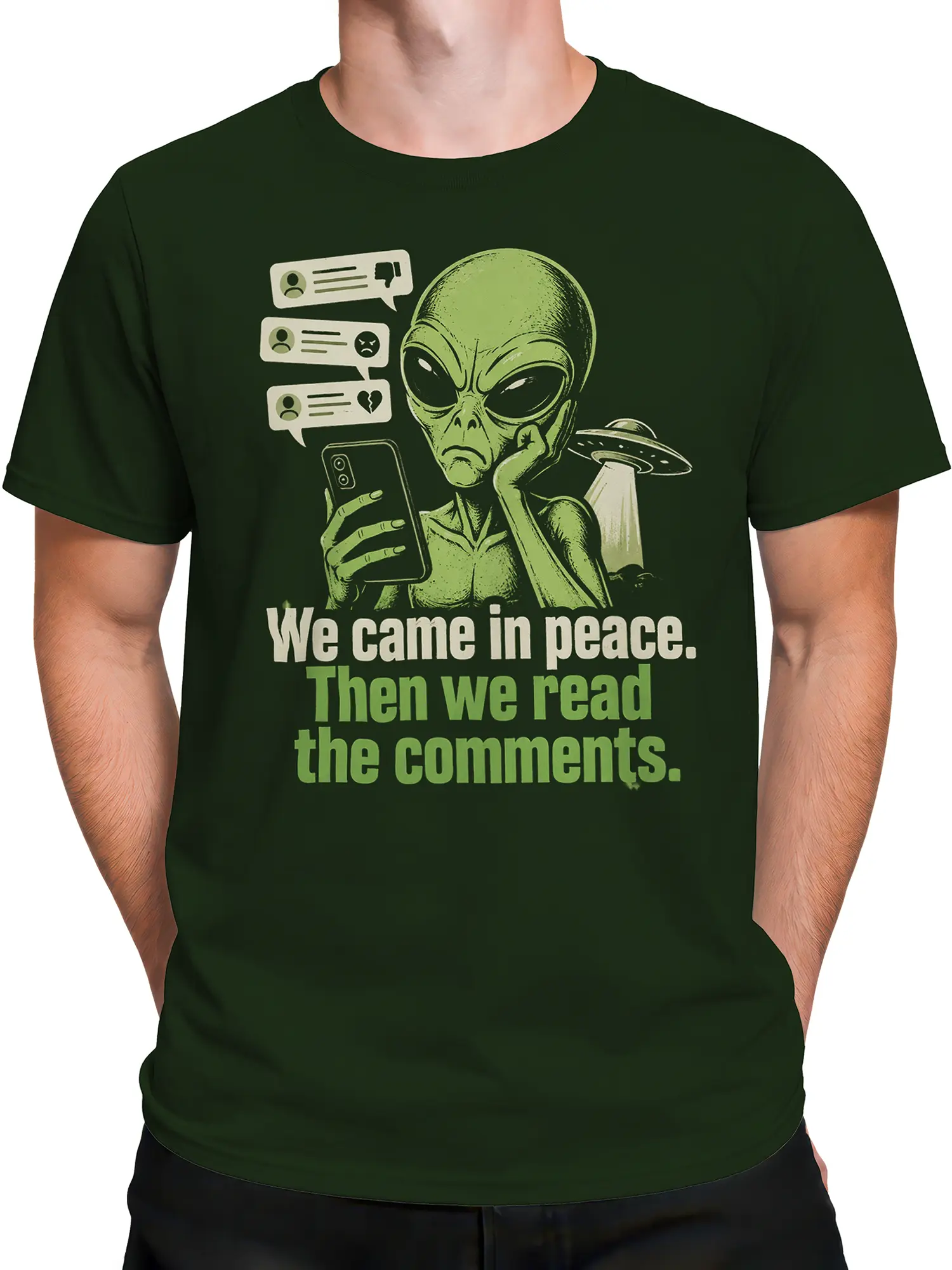 Male torso wearing a green alien graphic tee with a sarcastic comment message