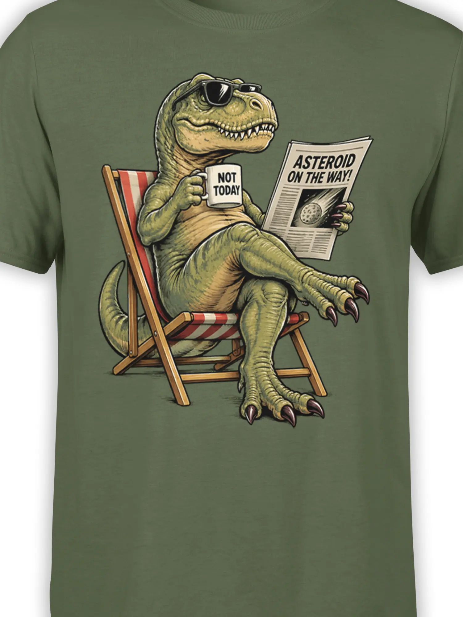 Close-up of olive green dinosaur graphic with sunglasses, asteroid headline, striped chair, and “NOT TODAY” coffee mug