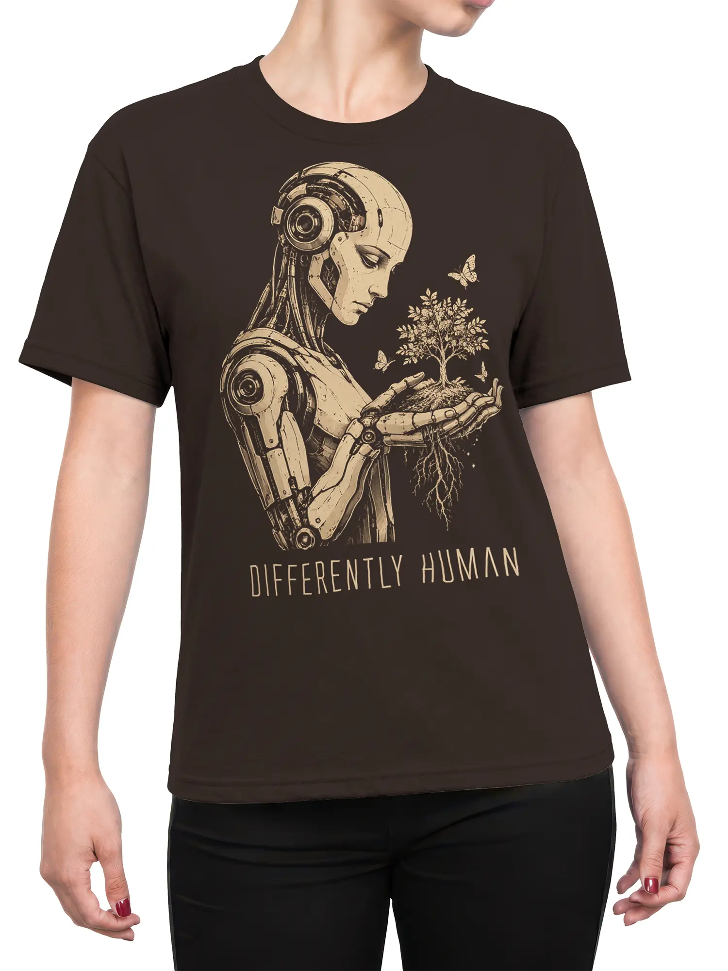 Female torso wearing a brown robot T-shirt with a tree, butterflies, and “Differently Human” graphic