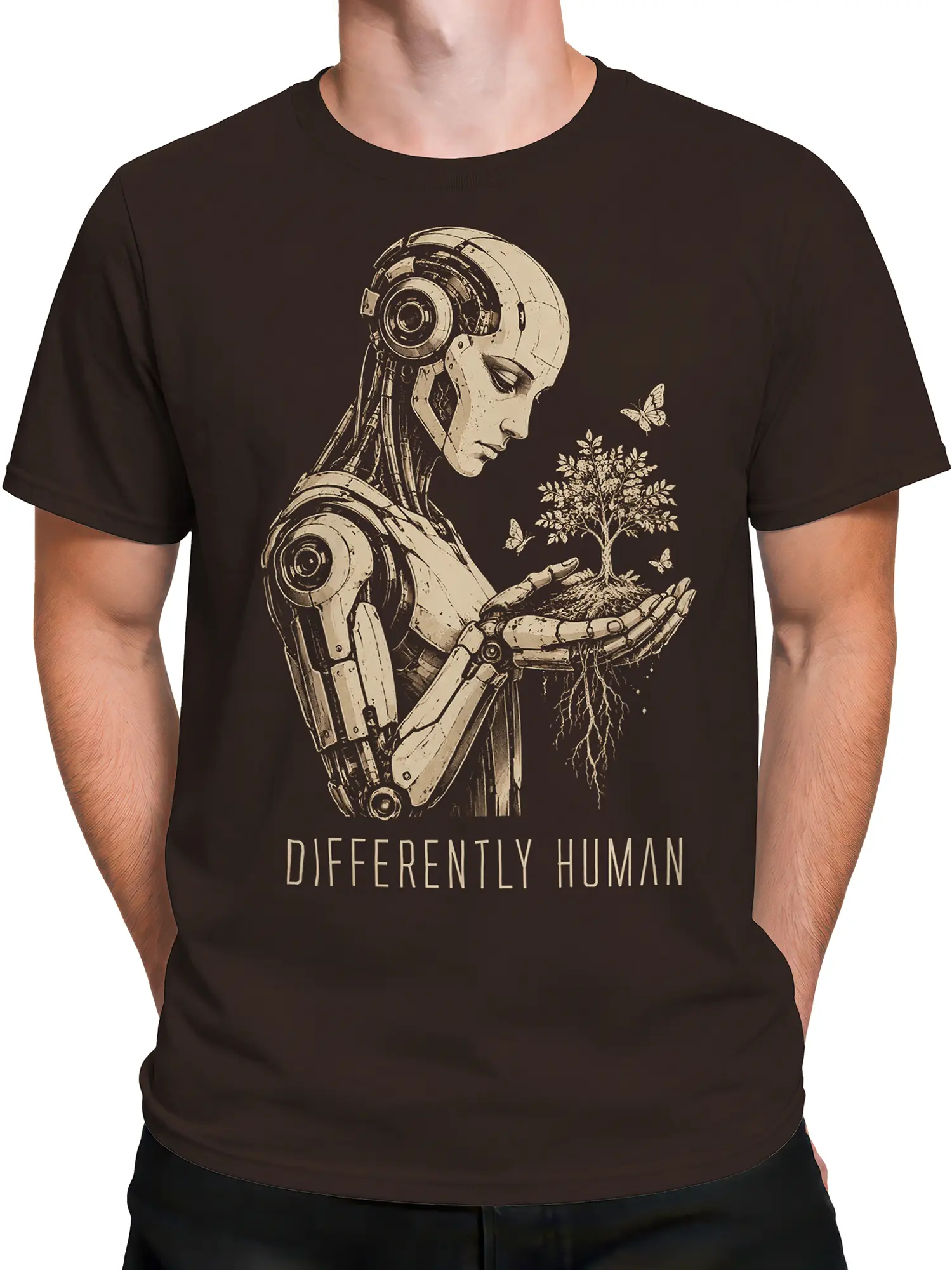 Male torso wearing a brown robot T-shirt with a rooted tree and “Differently Human” design