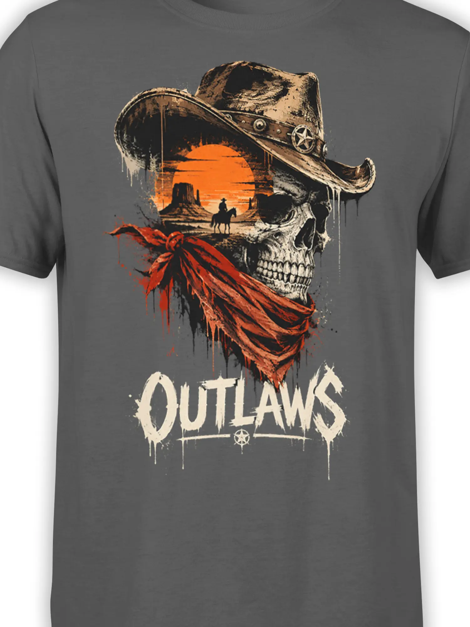 Close-up of the skull, cowboy hat, red bandana, desert sunset, and OUTLAWS design on a gray western T-shirt