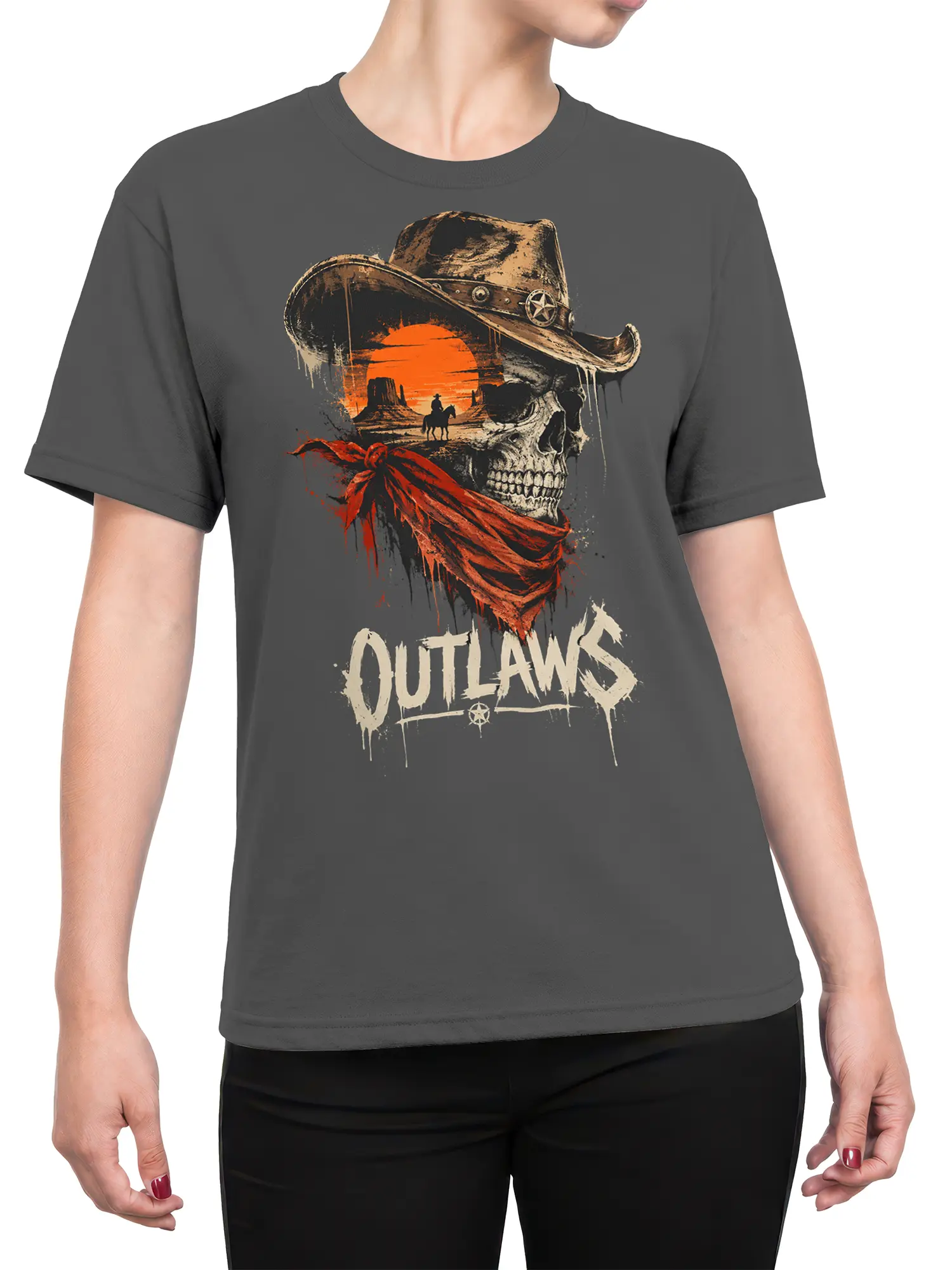 Female torso wearing a gray western T-shirt with a skull, cowboy hat, red bandana, and desert sunset graphic