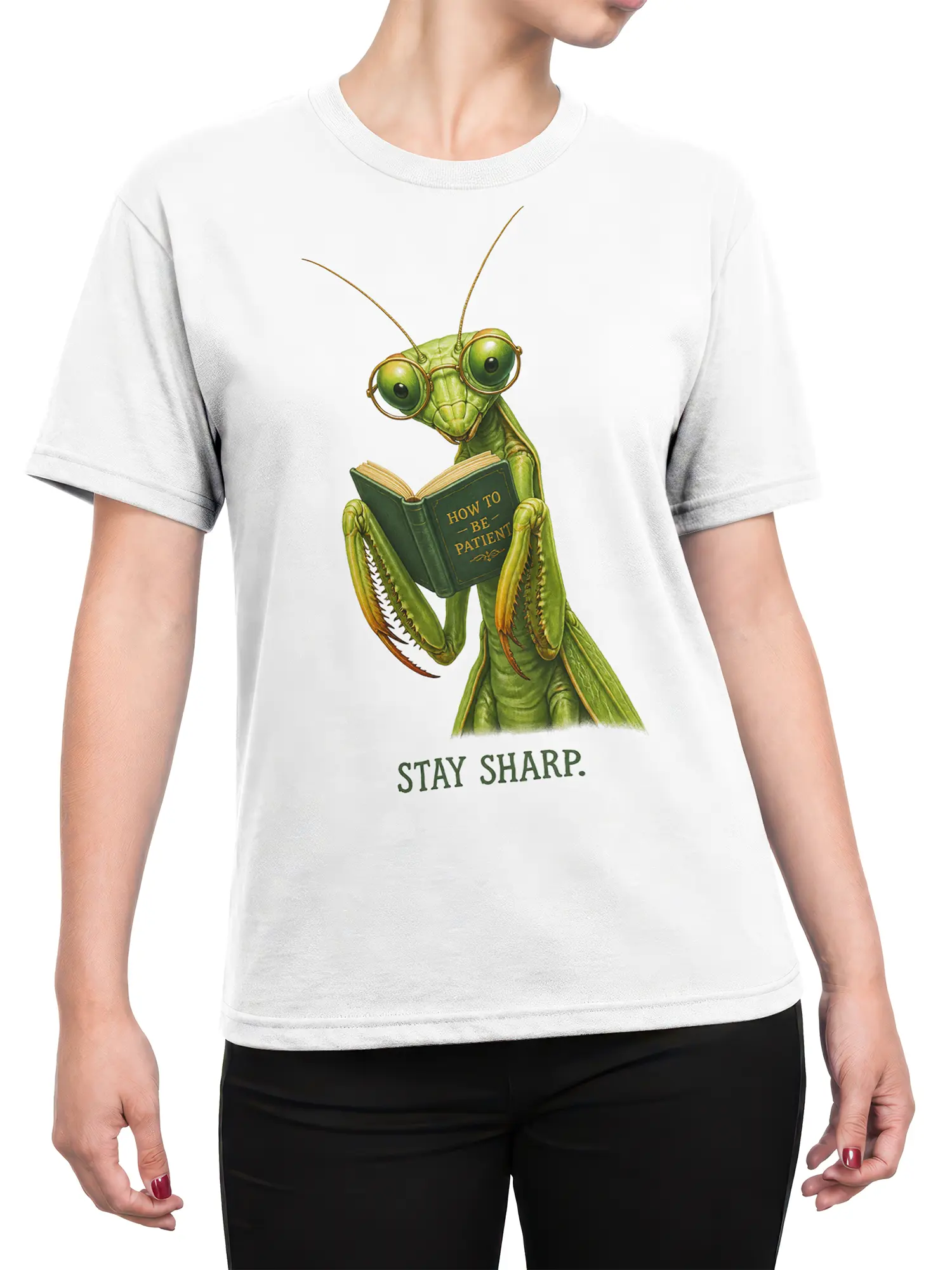 Female torso wearing a white praying mantis graphic tee with glasses, book artwork, and Stay Sharp text