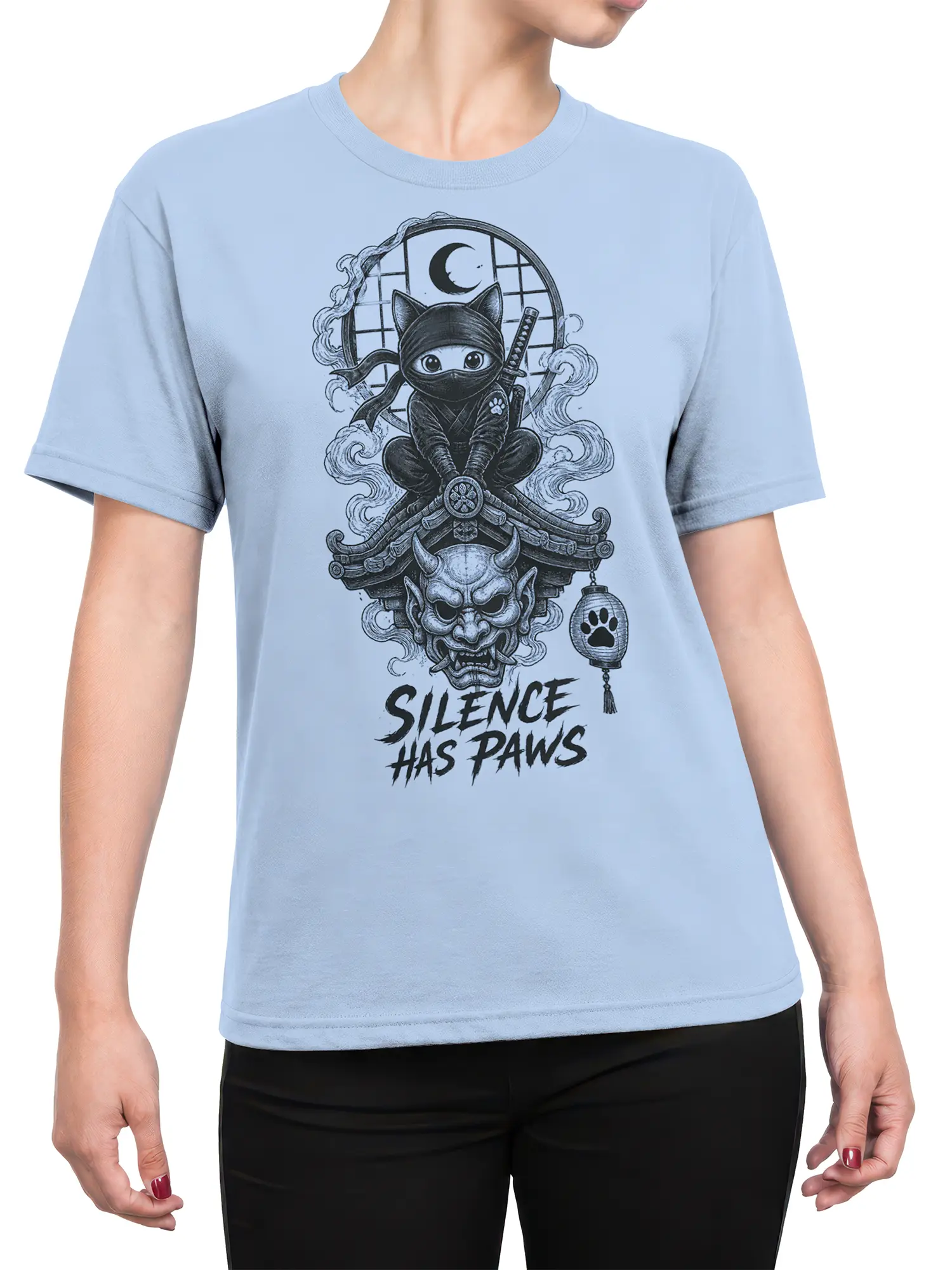 Female torso wearing a light blue T-shirt with a masked ninja cat and Silence Has Paws graphic